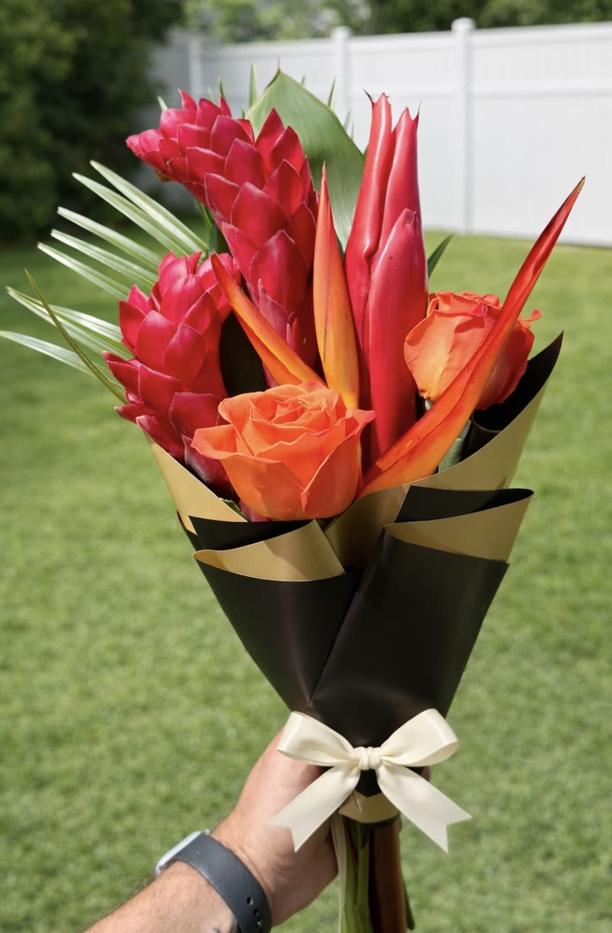 Signature Tropical Wrapped Bouquet  - A staple of our shop, this tropical wrapped bouquet is designed as our everyday offering—bringing fresh, thoughtfully curated flowers at an accessible price point without compromising style.