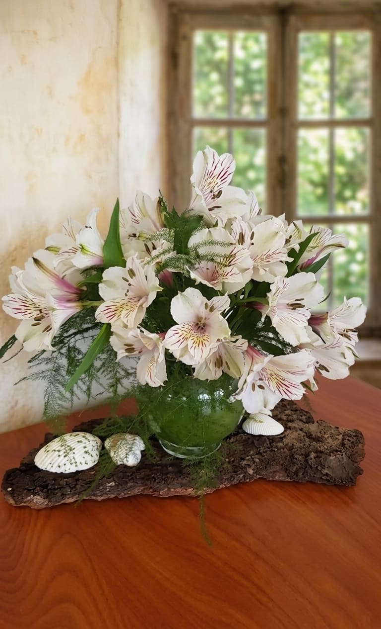 "Thinking of her" bouquet - Thinking of Her – Birthday Bouquet  Show someone you care with our “Thinking of Her” birthday bouquet, thoughtfully handcrafted by Specialty Floral Design, your local florist in Olympia, WA. This charming arrangement features crisp white alstroemeria, a bloom that symbolizes friendship, care, and devotion.  This bouquet is perfect for brightening small spaces like a work desk, nightstand, or cozy corner.  Ideal for birthdays, get-well wishes, or simply to lift someone’s spirits, this delicate bouquet sends a message of joy and encouragement, letting your loved one know they’re truly remembered.  Flower Delivery in Tumwater &amp; Surrounding Areas Specialty Floral Design offers same-day flower delivery in Tumwater, Olympia, Lacey, Shelton, Centralia, Tacoma, and nearby communities. Each bouquet is handcrafted with seasonal blooms, so colors may vary slightly, giving every arrangement a unique and personal touch.  Send a thoughtful, heartfelt gift today with the “Thinking of Her” bouquet—perfect for spreading cheer and showing someone how much they matter.  Please note: Each bouquet is handcrafted, so colors may vary based on seasonal availability        