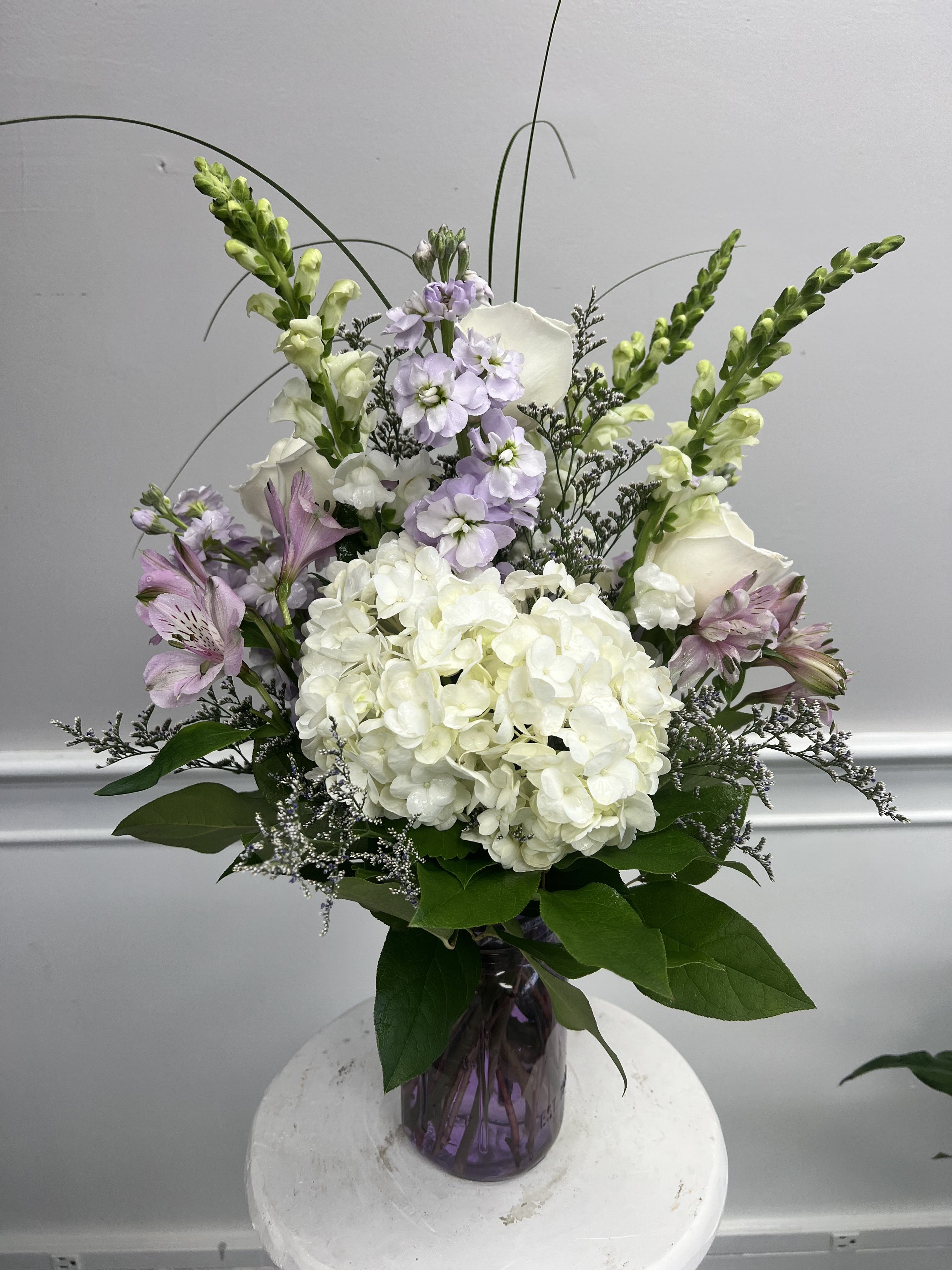 Lavender Whisper  - Soft, Serene tones of lavender and white blooms to create a calm and timeless charm