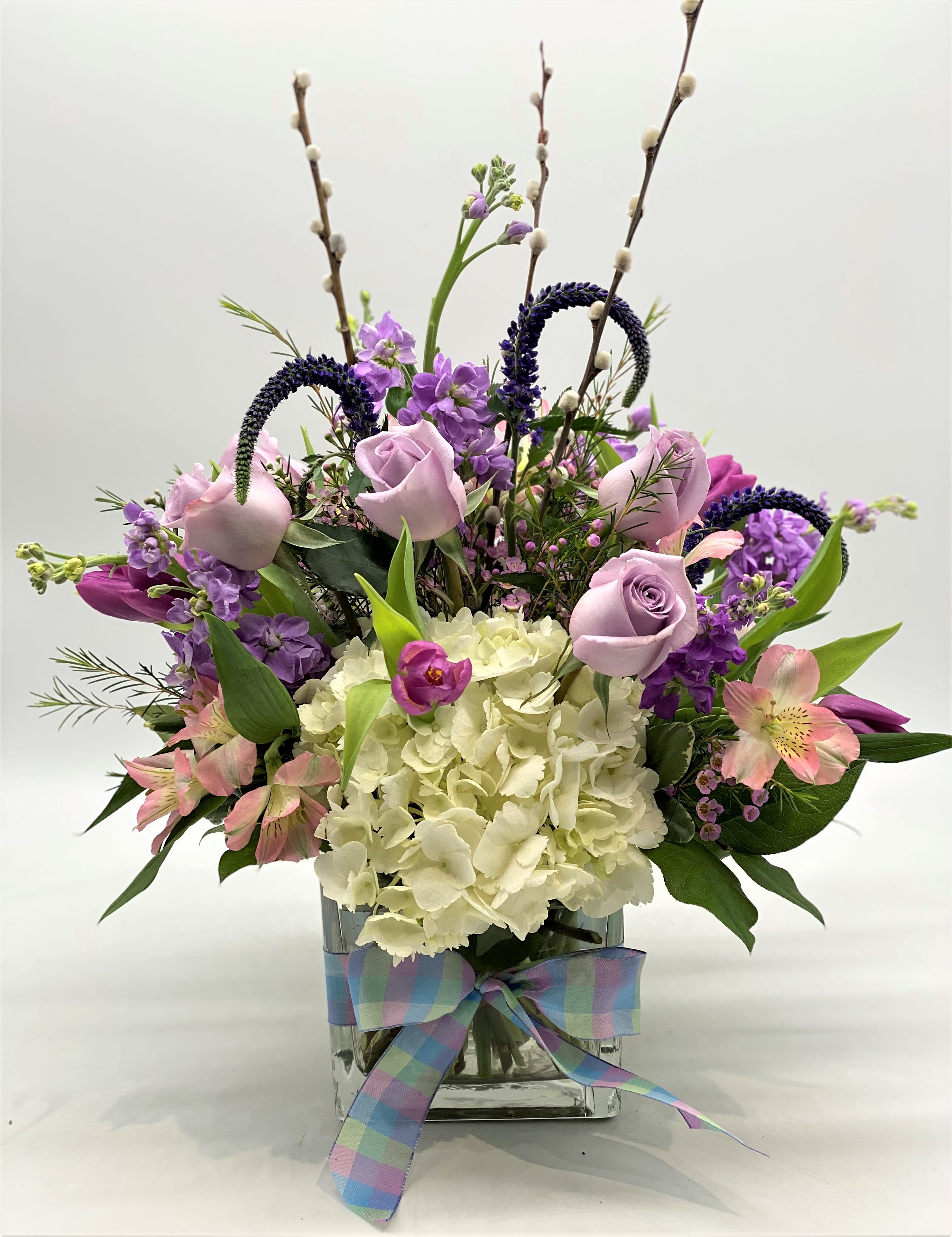The Purple Passion Cube - A beautiful glass cube filled with white hydrangeas and various shades of purple flowers!