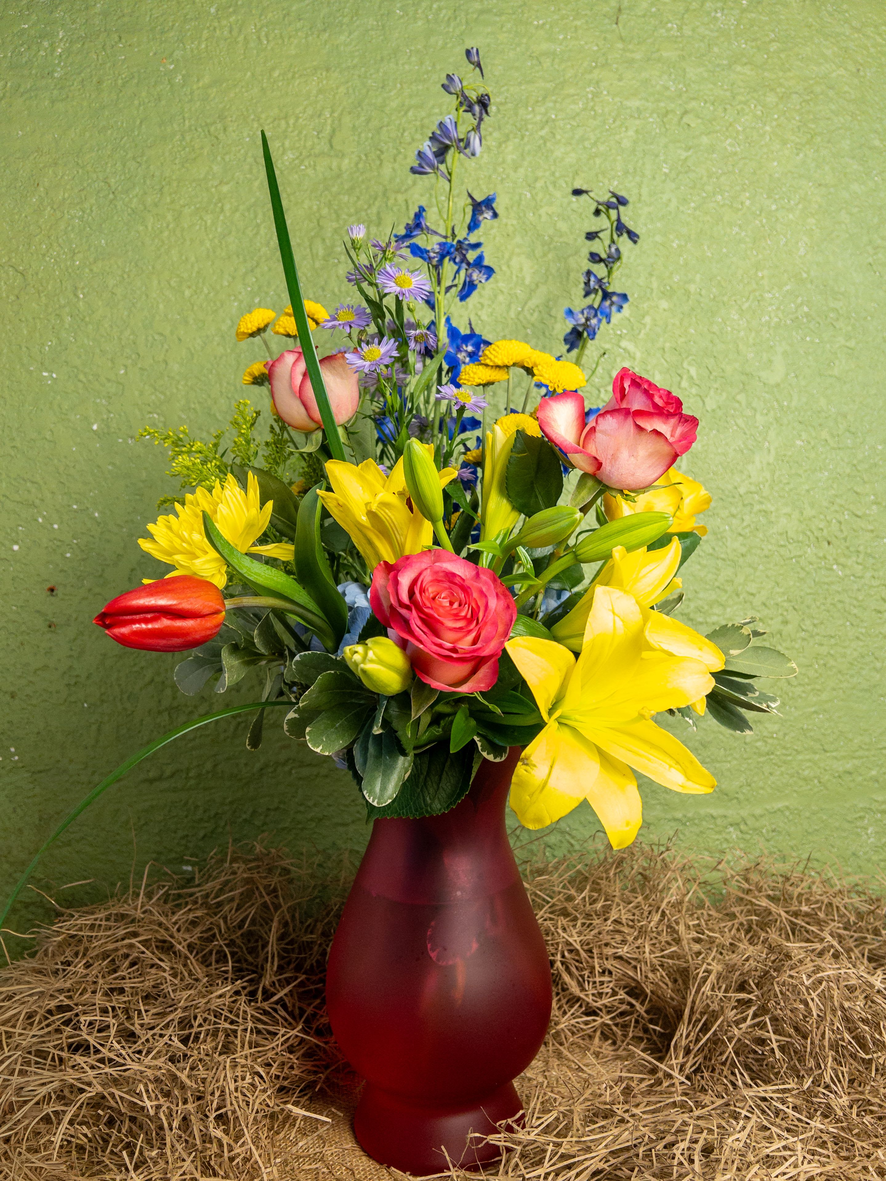 Garden Party Arrangement - Make a statement with Garden Party, a large arrangement bursting with hydrangea, lilies, roses, mums, delphinium, solidago, and pittosporum. This bold and festive arrangement is perfect for Easter gatherings, spring parties, or as a vibrant gift to impress someone special. Your favorite Baltimore Florist provides hassle-free Flower Delivery in Baltimore, ensuring your blooms arrive fresh and ready to delight.