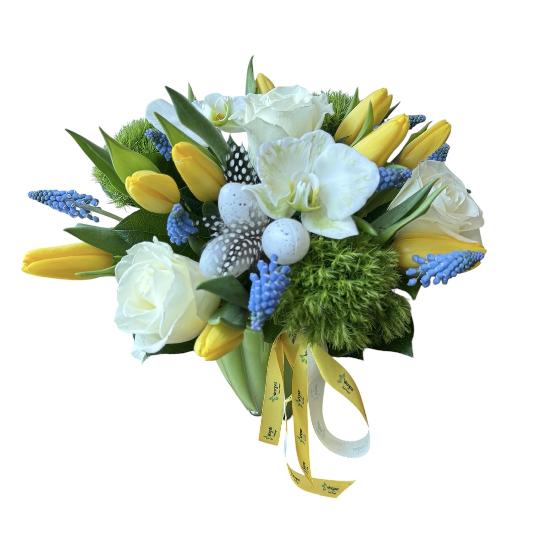 Spring Garden  - White roses, white orchids, yellow tulips, dianthus and muscari designed in a green glass vase.