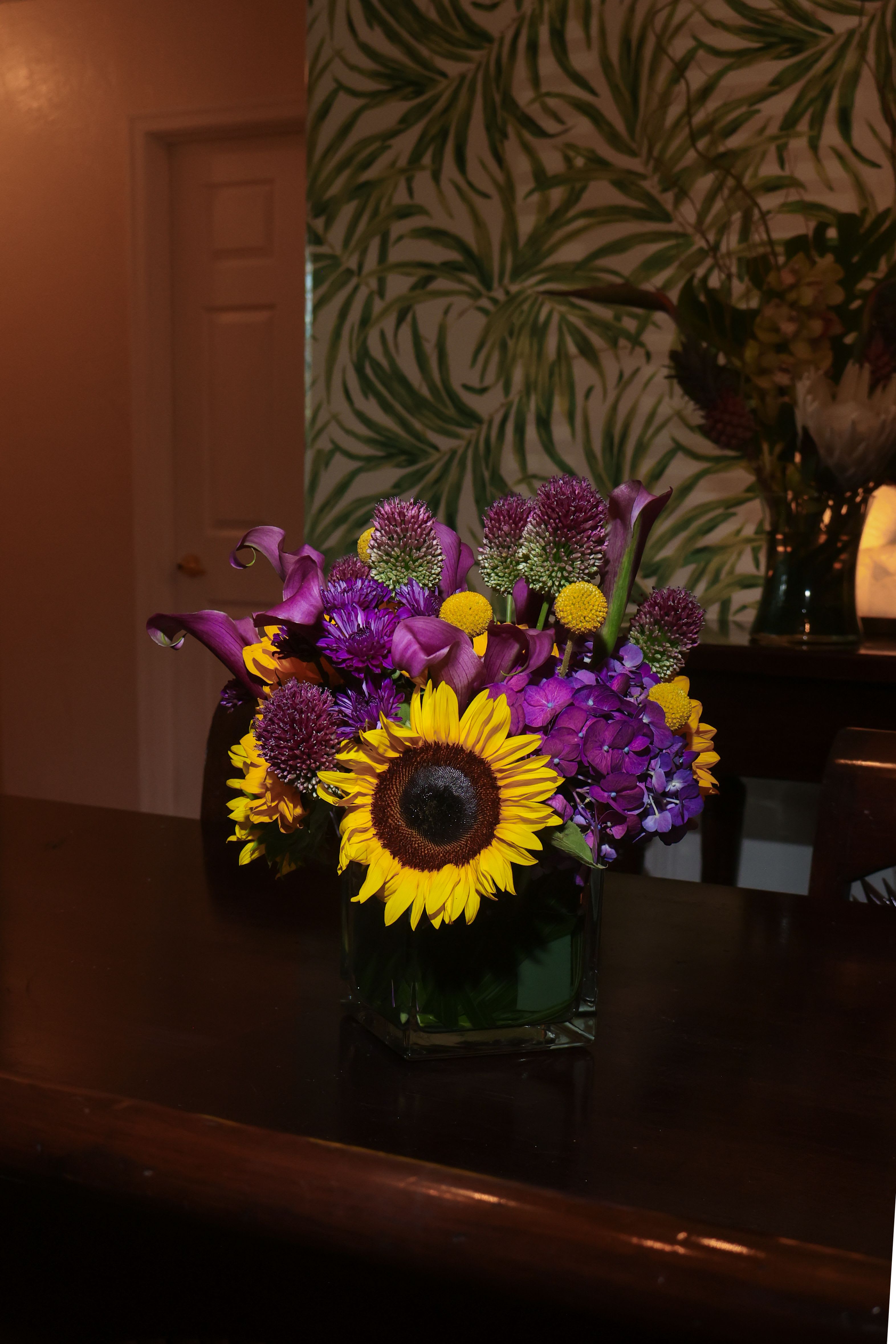 Just the two of us - An eye catching combination of purple and yellow seasonal flowers. Hydrangeas, Calli Lillis, Allium bullet and Billy balls. 