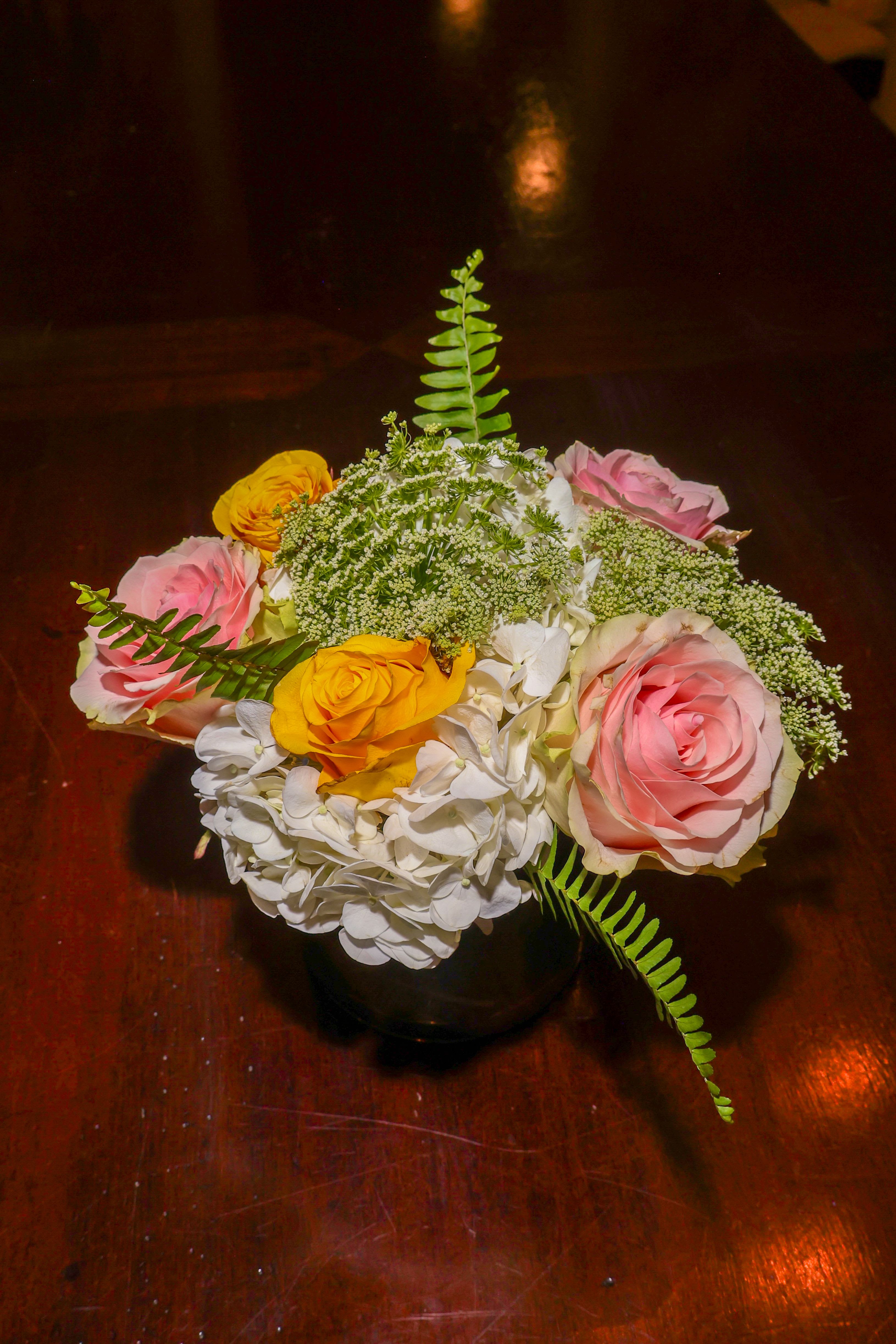 Pastel Box of Joy - A glass box vessel containing pastel Hydrangeas, Roses Queen Annes Lace and Fern.