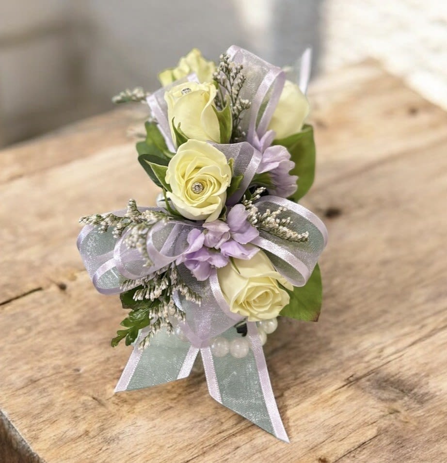 Grey House Blooms-Spray Rose Wristlet - Delicate wrist corsage designed with spray roses and accent florals and bow.  This design is versatile and can be made in any available spray rose color with coordinating accent florals and ribbon.  State your colors in the special instruction section.