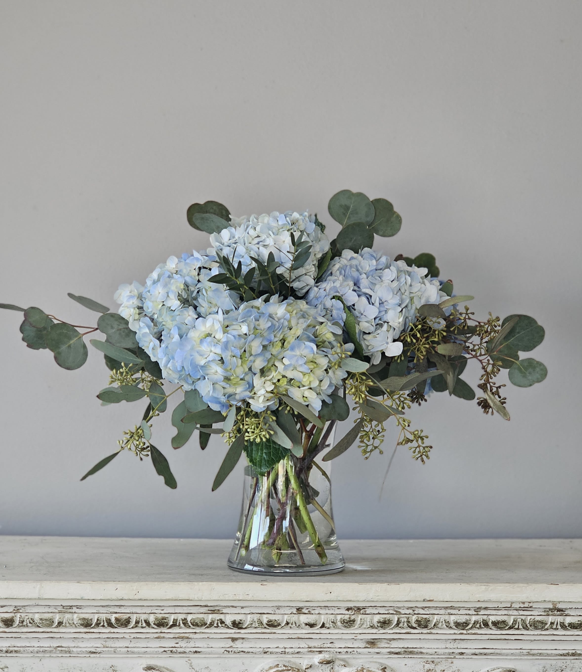 Blue Vibes - a lovely vase of blue hydrangea and seasonal greenery