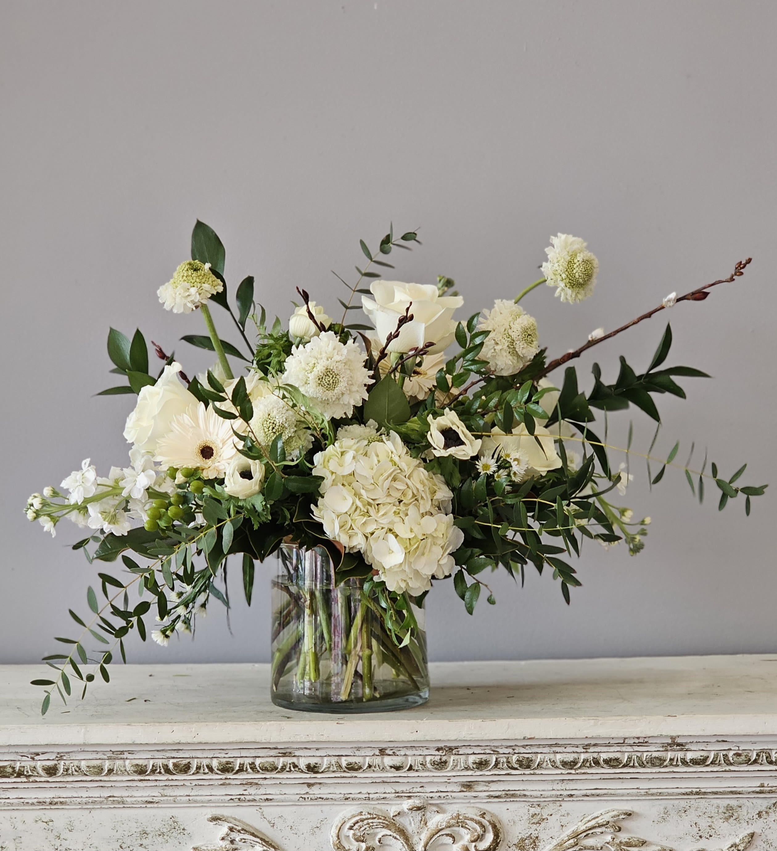 Serenity - This vase is a beautiful blend of flowers in a neutral white palette.