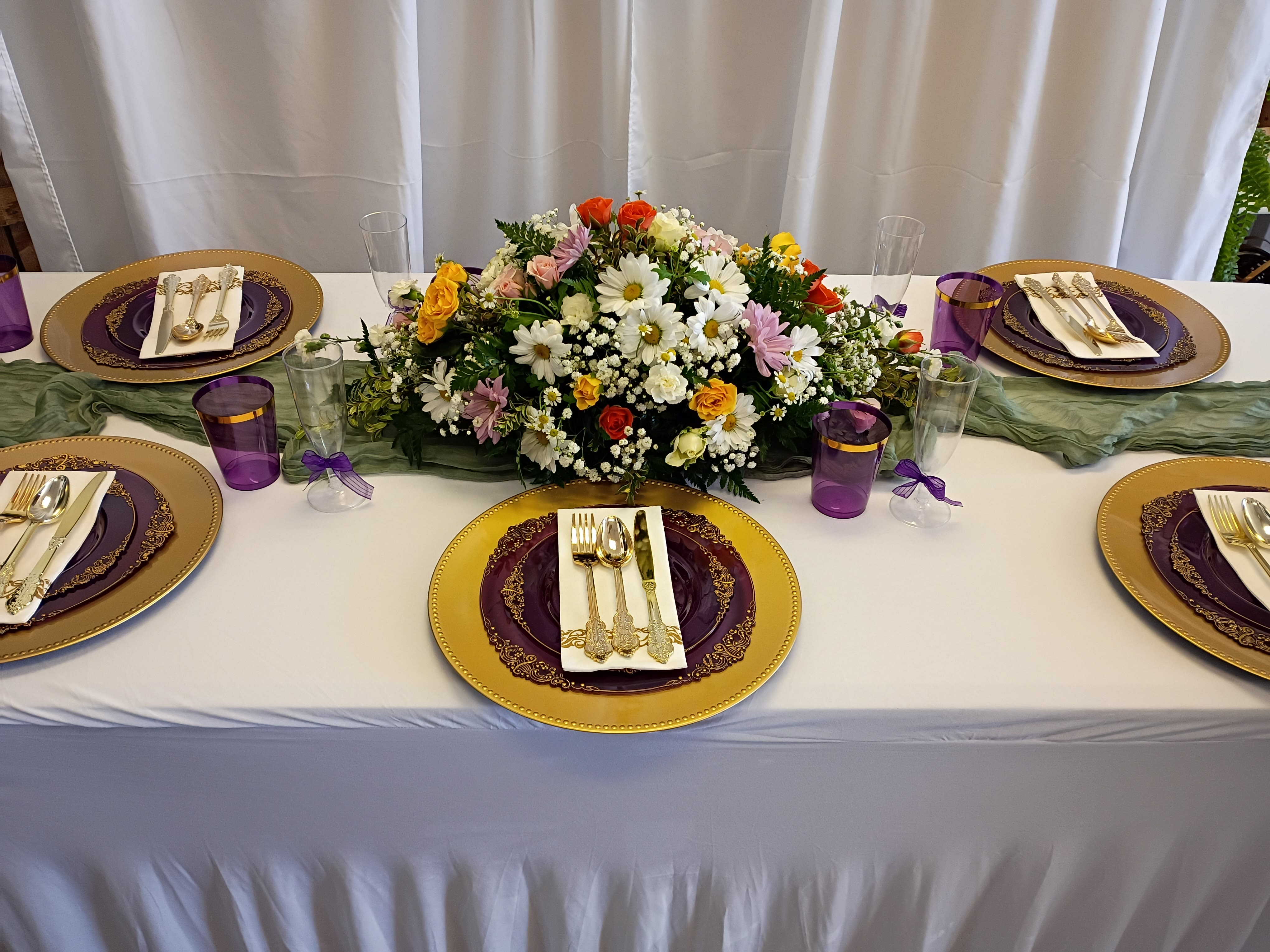  Ester Table Centerpiece - Elevate your dinner table with our stunning Shamrock Flowers long and low arrangement that is sure to impress.