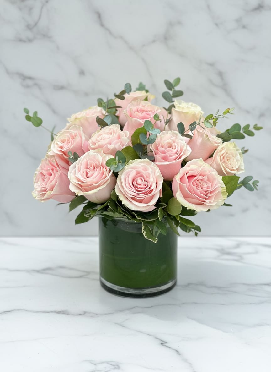  Pink Rose Cylinder - Pink Rose Cylinder – Classic Elegance in Blush  Simple, chic, and timeless — Pink Rose Cylinder features soft blush roses beautifully arranged in a modern green glass vase. This elegant design highlights the natural beauty of premium roses and lush greenery, making it perfect for anniversaries, birthdays, or everyday luxury. Handcrafted by Polk Street Florist in San Francisco, this bouquet brings effortless sophistication to any setting.