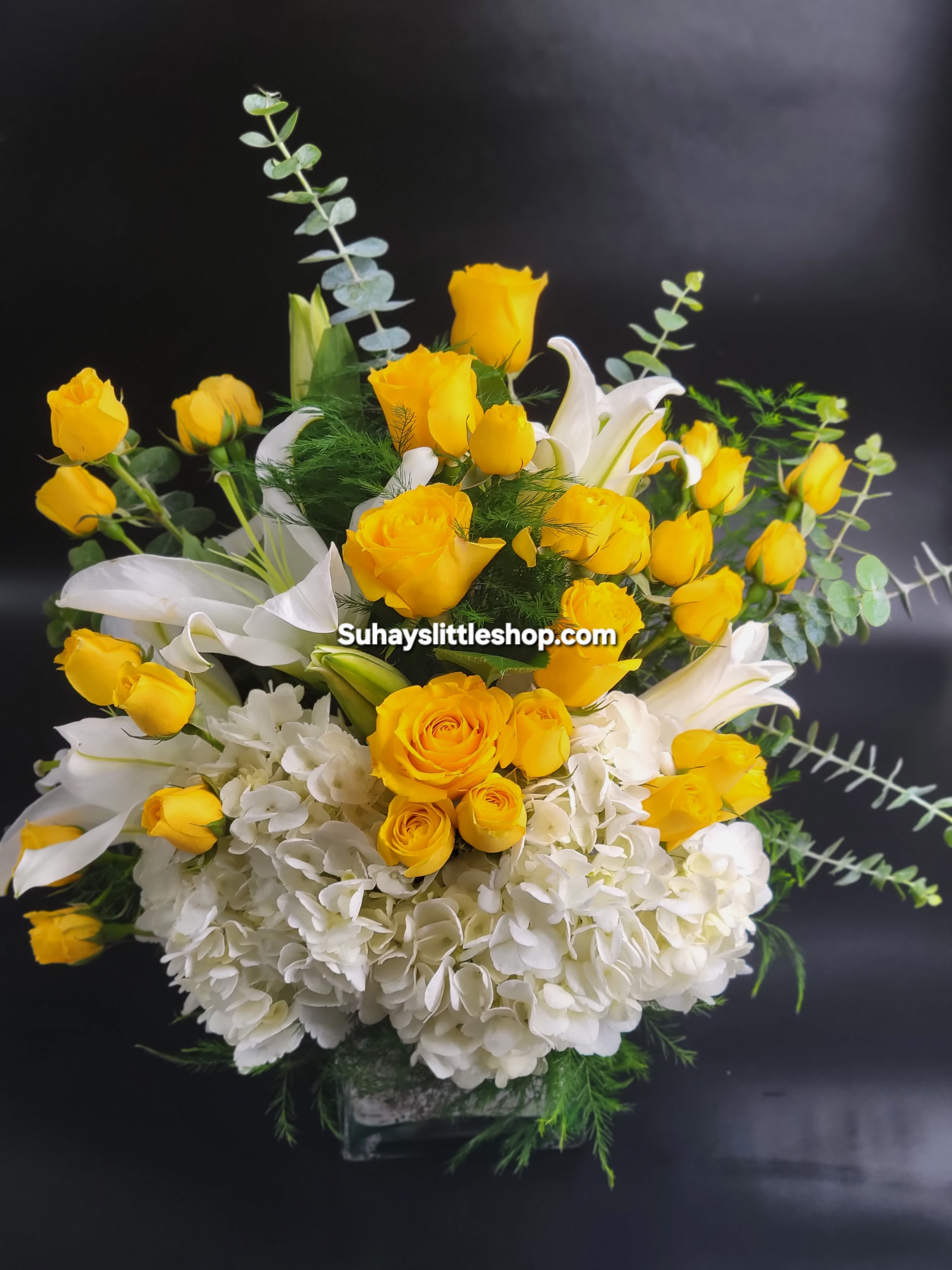 Bright Morning  - Beautiful amd bright  Yellow flowers ,Lilies and spray roses.  This is a good size Flower arrangement 