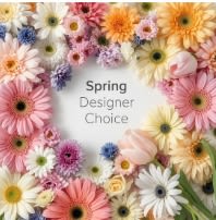 Pastel daisies, gerbera daisies, mums, tulips, and roses framing text that reads Spring Designer Choice