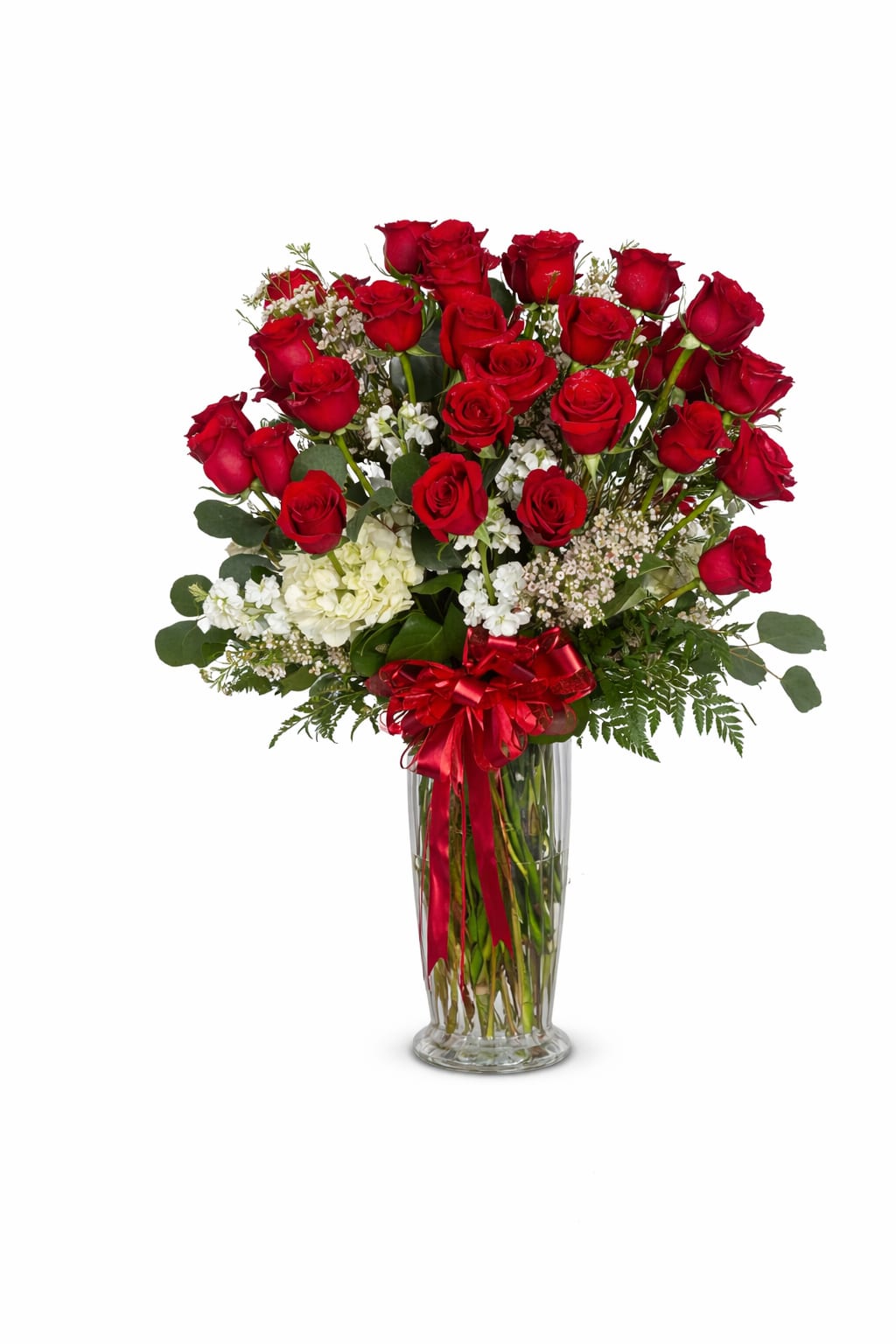 50 Premium  Roses - A grand and elegant arrangement featuring 50 Ecuadorian premium long stem red roses, accented with seasonal blooms and greenery.Presented in a classic glass vase for a sophisticate and luxury look.