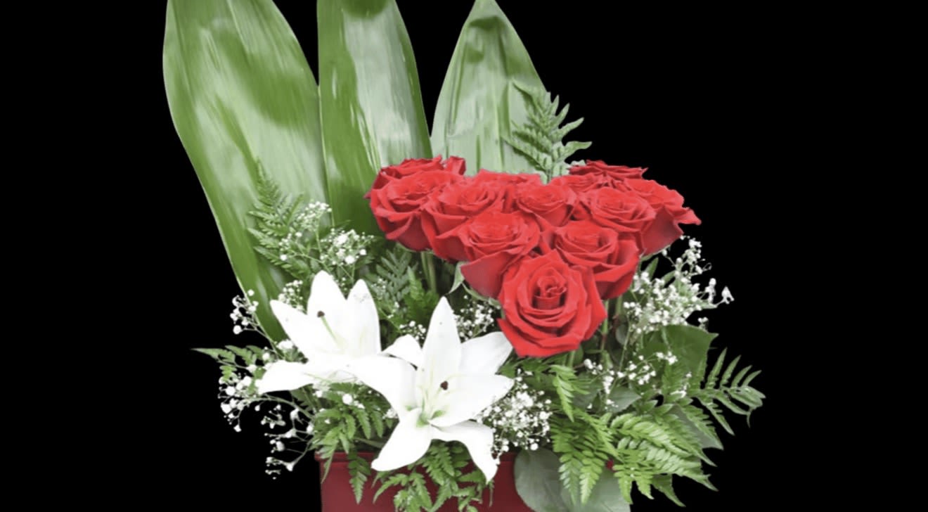 Love my Heart Arrangement  - One dozen Ecuadorian roses with lily’s (color may vary). 