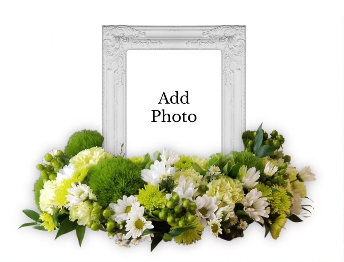 UW1 - Website Urn Wreath - 12" Wreath holds 8x10 photo frame, or Urn. Frame must be supplied before arrangement is designed. Urn can be added at service.