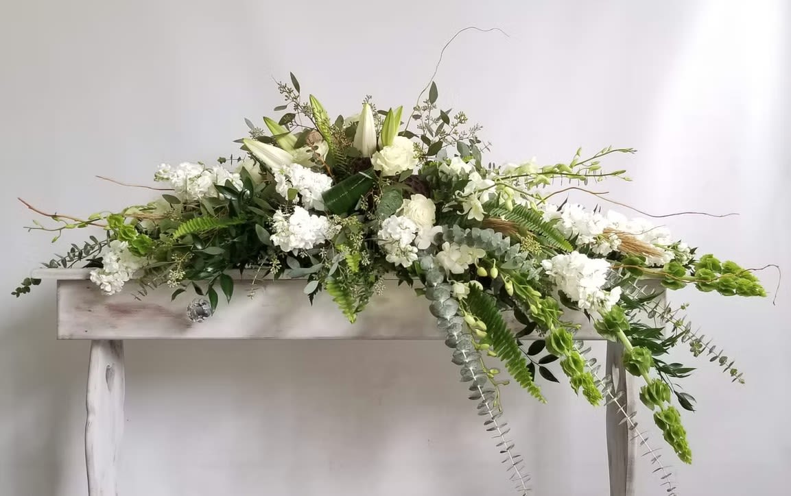 CS20 - Website Casket Spray - Flowers are subject to substitution and availability.