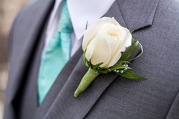 Boutonnieres - Elegant boutonniere to elevate any special occasion.  Available in any color.   