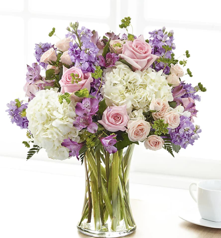 Pink Lavender Harmony - Send love and grace with this exquisite arrangement. This stunning bouquet features beautiful blooms. For long–lasting blooms, replace the water daily. We suggest trimming the stems every couple days. Pet Safety Precautions: This bouquet or plant may include flowers and foliage that are known to be toxic to pets. To keep them safe, be sure to keep this arrangement out of your pet's reach. Bloom Details Rose Stock Alstroemeria Hydrangea 