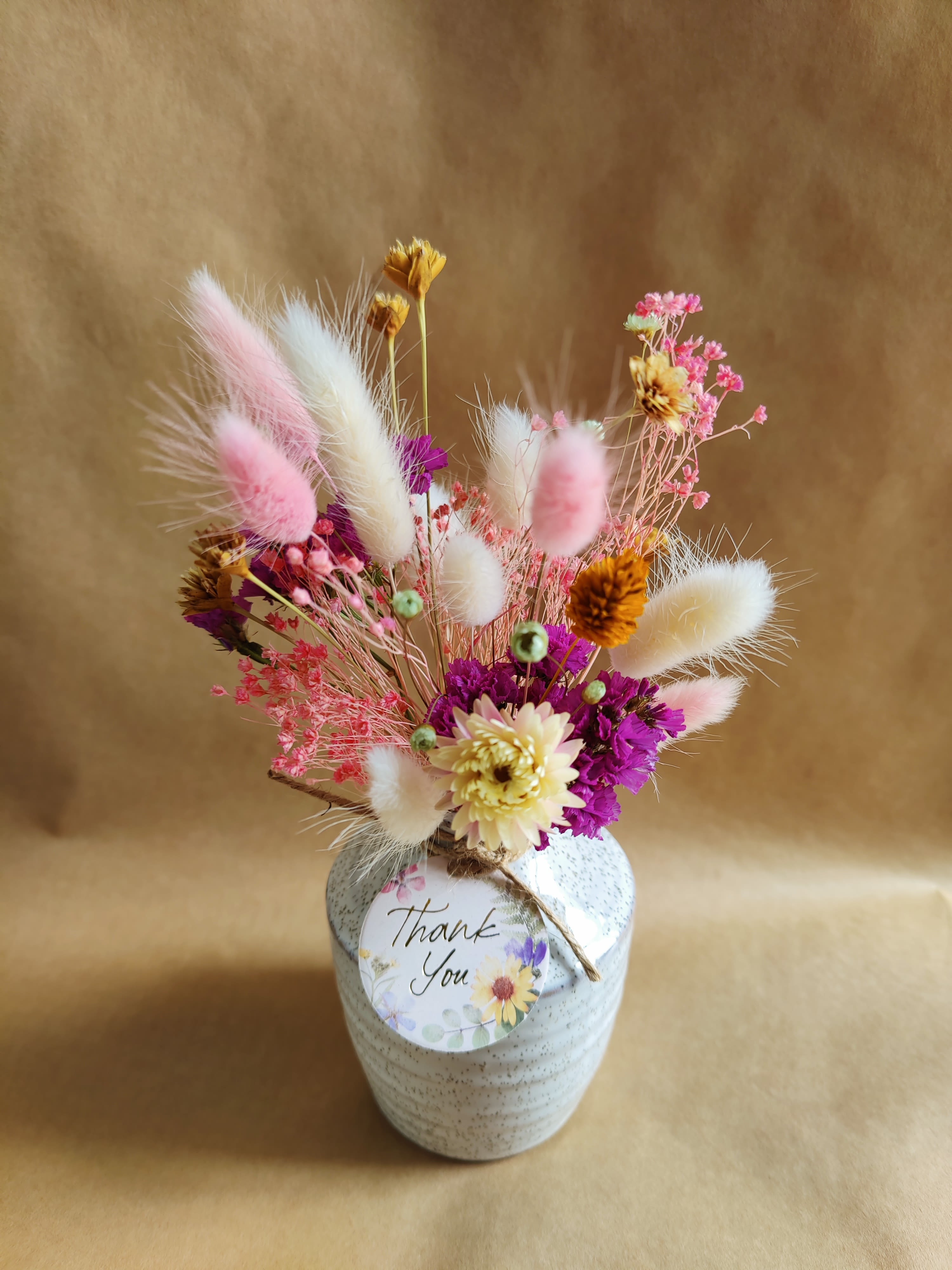 " Forever Moments" Dried Floral arrangement  - Send a beautiful message with this gorgeous bud vase decorated with preserved and dried florals.  Petite size Soft colors  Sometimes less is more.  Simply beautiful.    