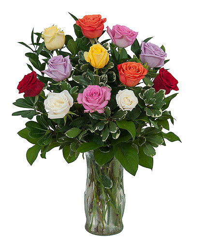 Mixed-color roses in a clear glass vase