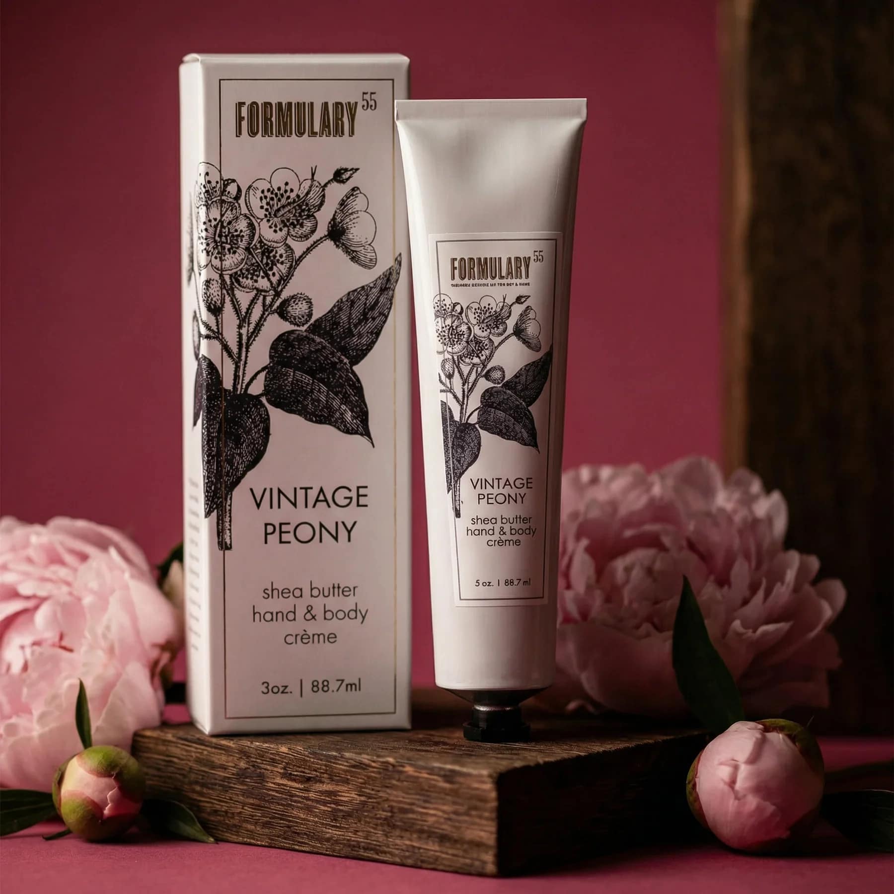 Vintage Peony - On-the-Go Shea Butter Hand and Body Creme Tube - Take Your Favorite Hand and Body Crème Anywhere!  Now you can enjoy your favorite hand and body crème wherever you go. Our new 3oz travel-size aluminum tube fits easily into your purse or handbag, making it perfect for use anytime, anywhere.  Each tube is beautifully packaged in a gift box designed specifically for its fragrance, featuring the signature black and white botanical Formulary 55 designs you know and love. It's the perfect gift for yourself or someone special.  Benefits of our travel tubes:  TSA-approved for carry-on luggage 100% recyclable aluminum packaging Compact size fits easily in a purse or handbag Easy-to-use screw-on cap  Details:  Scent: Soft velvety bouquet of bursting peonies delicately laced with violet and honeysuckle and warmed with seductive amber and soft musk. Size/Description: This light-weight hand creme contains 5% shea butter. It's perfect for anyone who wants a rich moisturizer without a heavy greasy feel. Healing aloe and vitamin E help restore softness and elasticity. 3oz aluminum tube