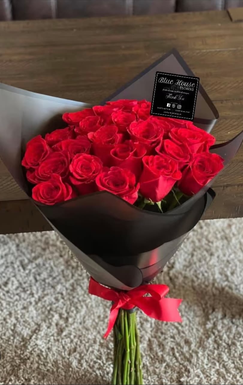 Love 30 Roses - Beautiful 30 red roses wrapped in black Korean paper tied with a ribbon and topped with a buterfly 