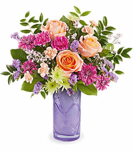 Teleflora's Pretty Daydream - Celebrate her sweetest moments with Teleflora's Pretty Daydream Bouquet, a dreamy mix of soft, vibrant blooms beautifully arranged in Teleflora's Pretty Daydream Vase-a charming keepsake she'll enjoy long after Mother's Day.