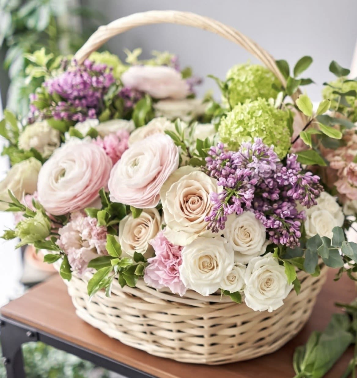 Pastel Skies - Lush basket of pastel petals including hydrangea, roses, ranunculus, dianthus, lavender lisianthus 