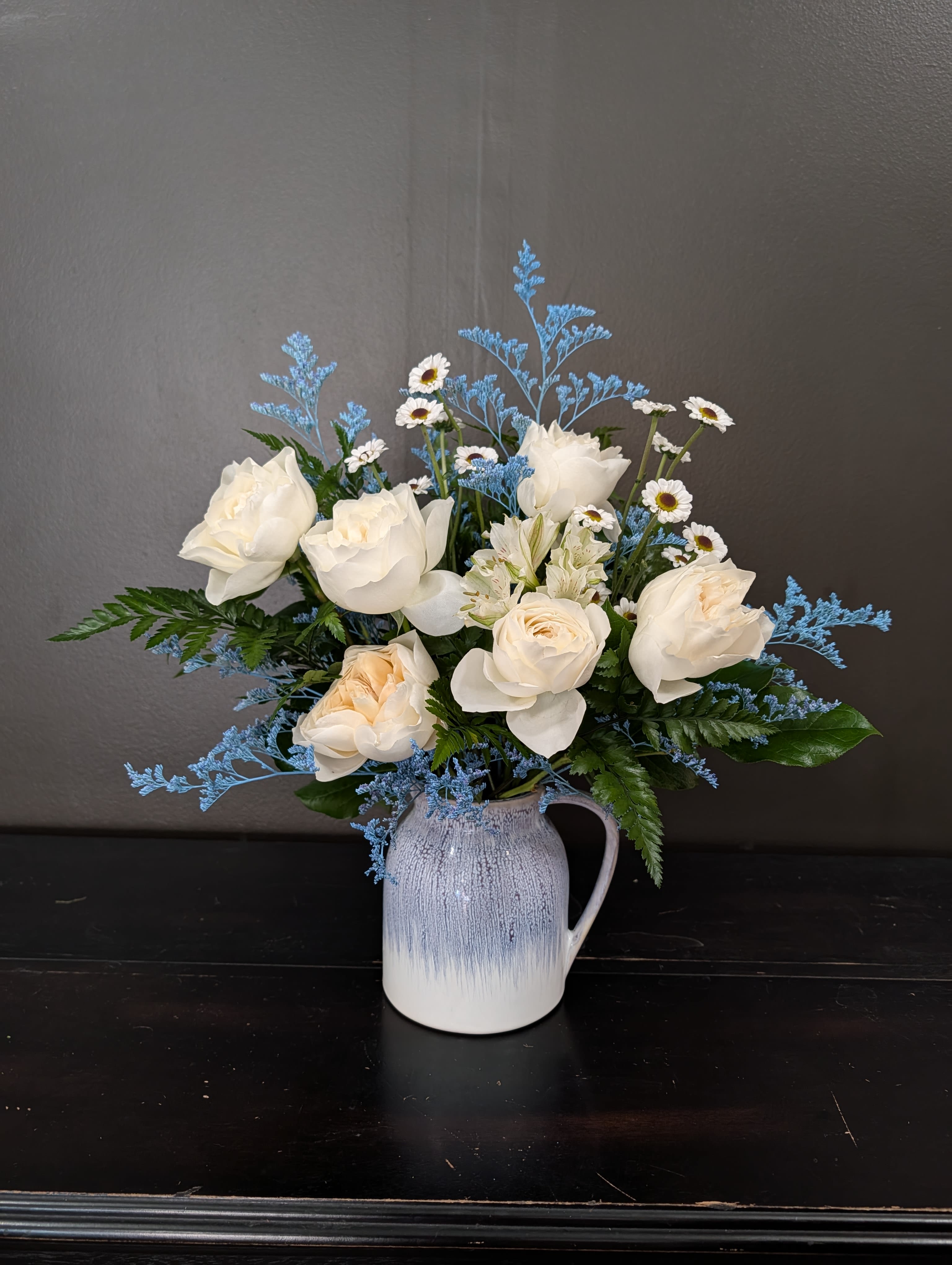 Pour Up The Pretty Pitcher - A blue and white arrangement in a ceramic pitcher.