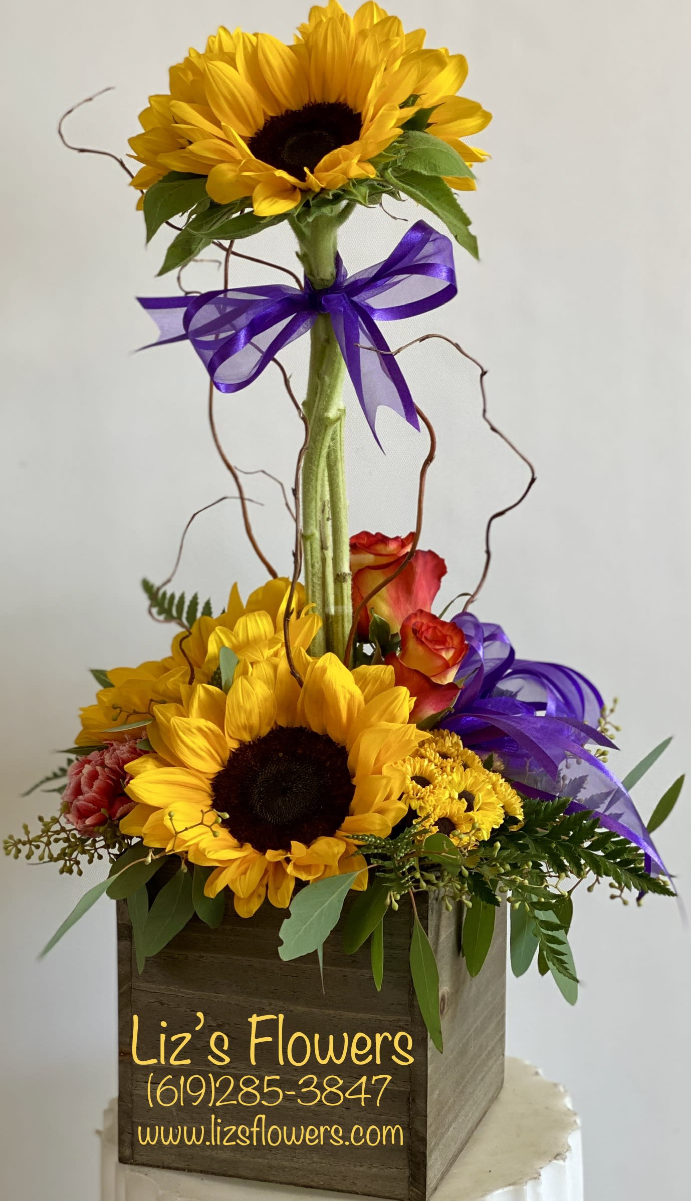 The beauty of Sunflowers - Sunflowers are so beautiful in the topiary style.  This arrangement will be an eye- catching gift to anyone!