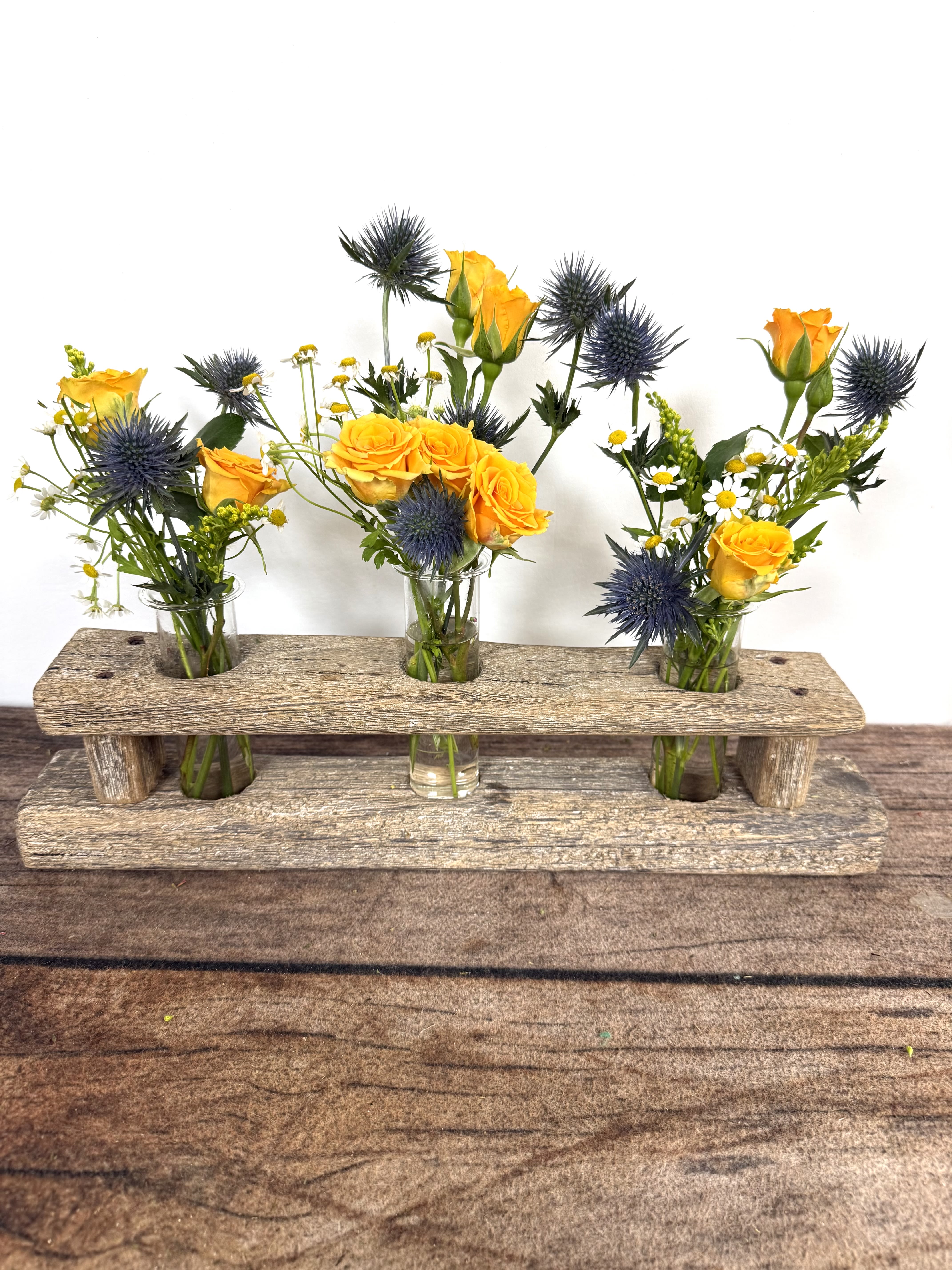 Wildflower Crate - A rustic driftwood vase is the perfect vessel to hold these wildflowers. 19" l x 10" h