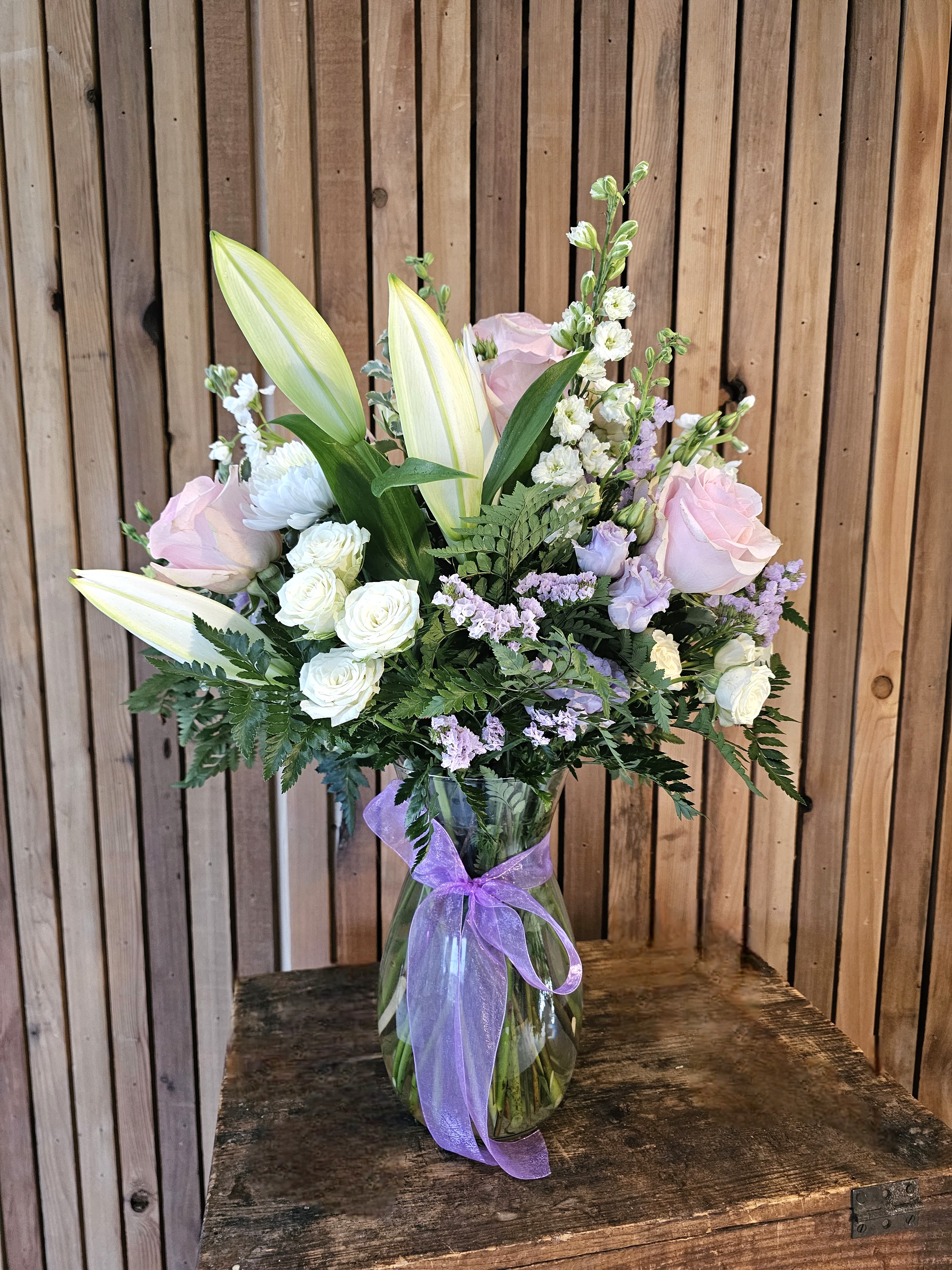 Blushing Lilies - This bouquet will include light and soft colors including soft pinks and lavenders, surrounded by white.