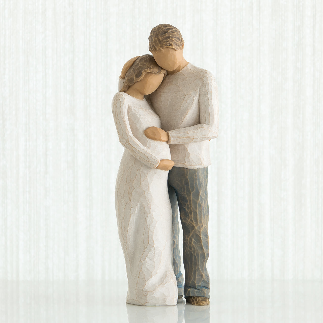 WILLOW TREE - HOME  - "Together, our family is home" A gift to celebrate new beginnings, new babies, new families… and the loving relationships that develop between parent and child. 8.5" sculpted figure by Susan Lordi Carved resin, hand-painted. Dust with soft cloth or soft brush. Avoid water or cleaning solvents 