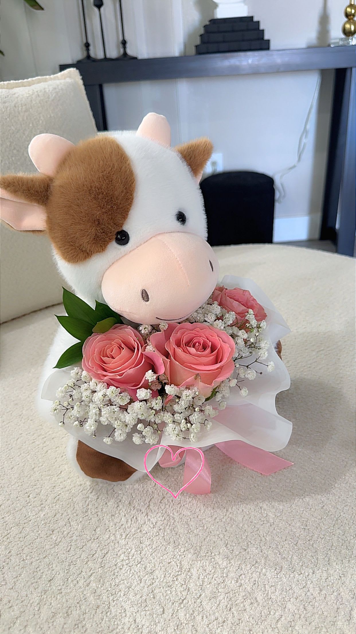 Cow Plush &amp; Pink Roses - Sweet, soft, and full of charm   This beautiful gift includes a plush cow paired with a delicate bouquet of pink roses and baby’s breath, wrapped in a soft and elegant style. Perfect for birthdays, get well wishes, or a thoughtful surprise.   Handcrafted with love by Lone Star Gifts  Midland, Odessa &amp; Gardendale delivery  Same-day delivery available 