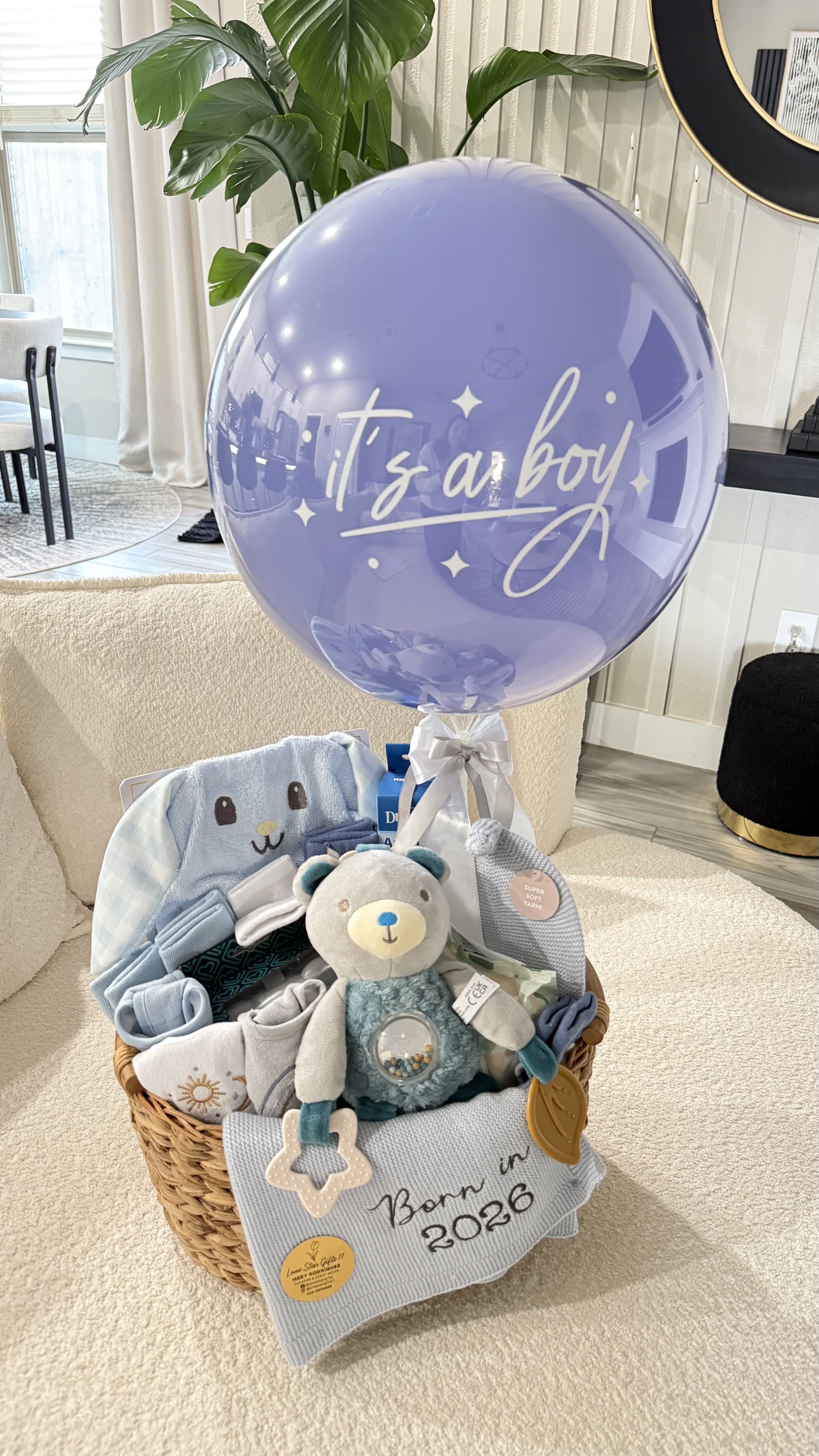 Baby Boy Luxury Gift Basket - Celebrate the arrival of a baby boy or baby Girl  with this beautiful and thoughtfully curated gift   Our Baby Boy Luxury Gift Basket includes a charming selection of baby essentials such as soft towels, cozy blanket, socks, baby wipes, a plush toy, and other adorable items, all carefully arranged in a woven basket. It is topped with a stylish “It’s a Boy” balloon for a perfect finishing touch.  Each basket is designed with love to create a memorable and practical gift for new parents.   Handcrafted with care by Lone Star Gifts  Includes a variety of baby essentials  Balloon included  Available for delivery in Midland, Odessa &amp; Gardendale  ⸻  ️ Nota importante:  Items may vary depending on availability, but the overall style, color theme, and value will always be maintained. 