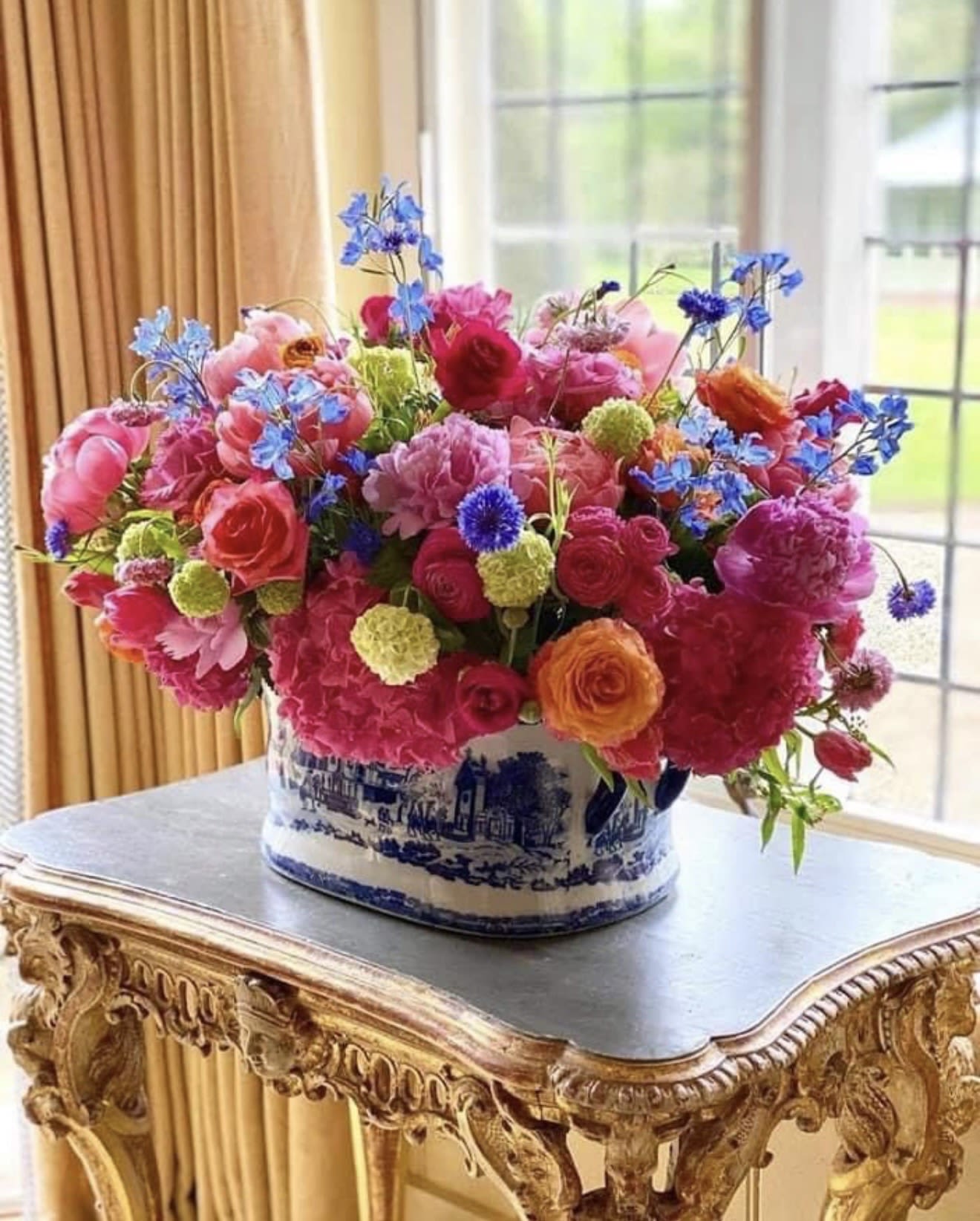 Your majesty  - A vital and bright arrangement in oriental vase with vibrant colors is a stunning arrangement of flowers that exudes energy and liveliness. The bouquet features a variety of bold and vibrant blooms. The combination of these vibrant colors creates a visually striking and captivating display. The bouquet may include flowers such as roses, daisies, and tulips, berries, peonies, ranunculus, among others. Each flower contributes to the overall vibrancy of the bouquet, making it a perfect choice for adding a burst of color and vitality to any space or occasion.