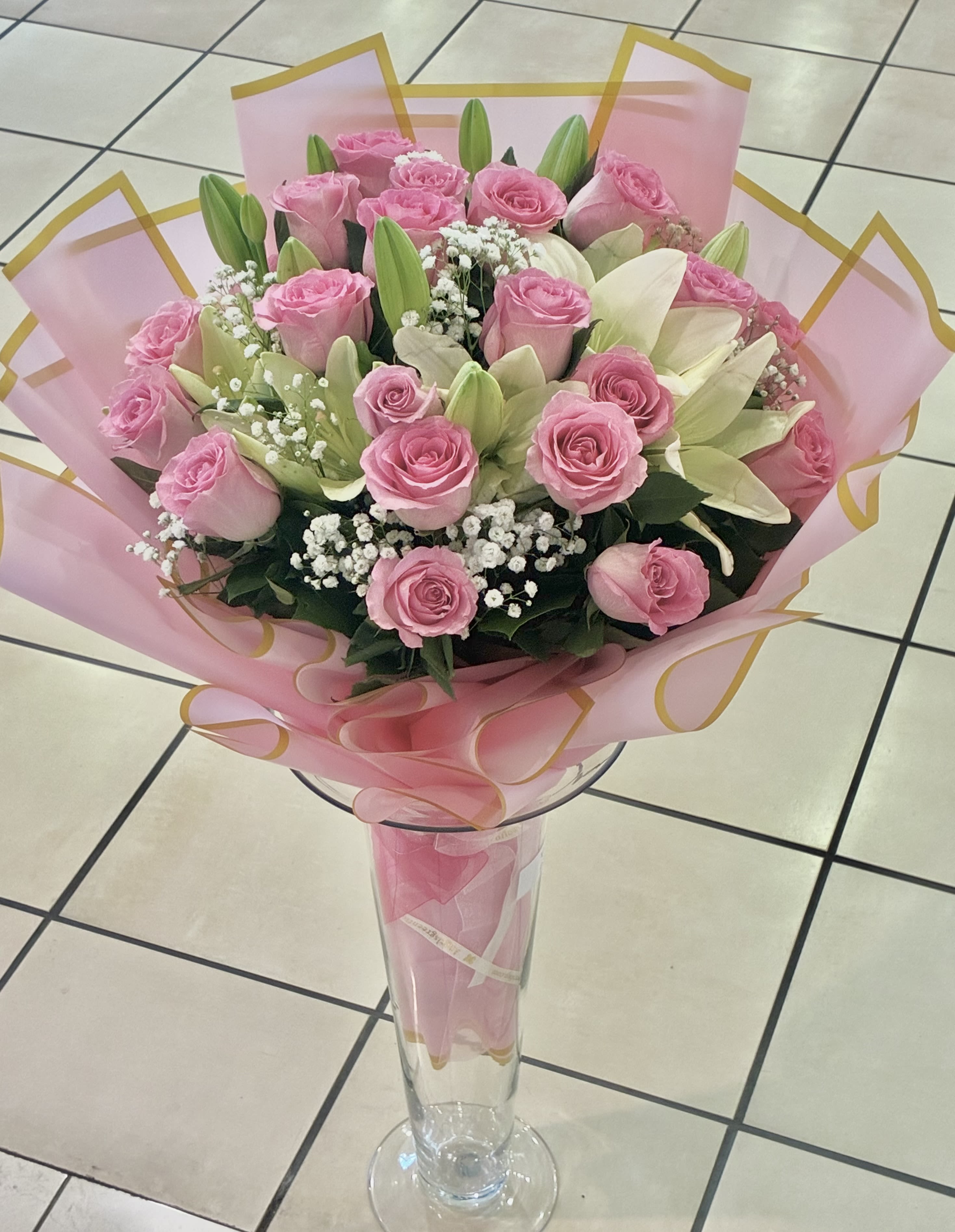 Fresh Pink - Pink Rose, Baby Breath, White Lily and Greens with pink Wrap, Vase not including.  