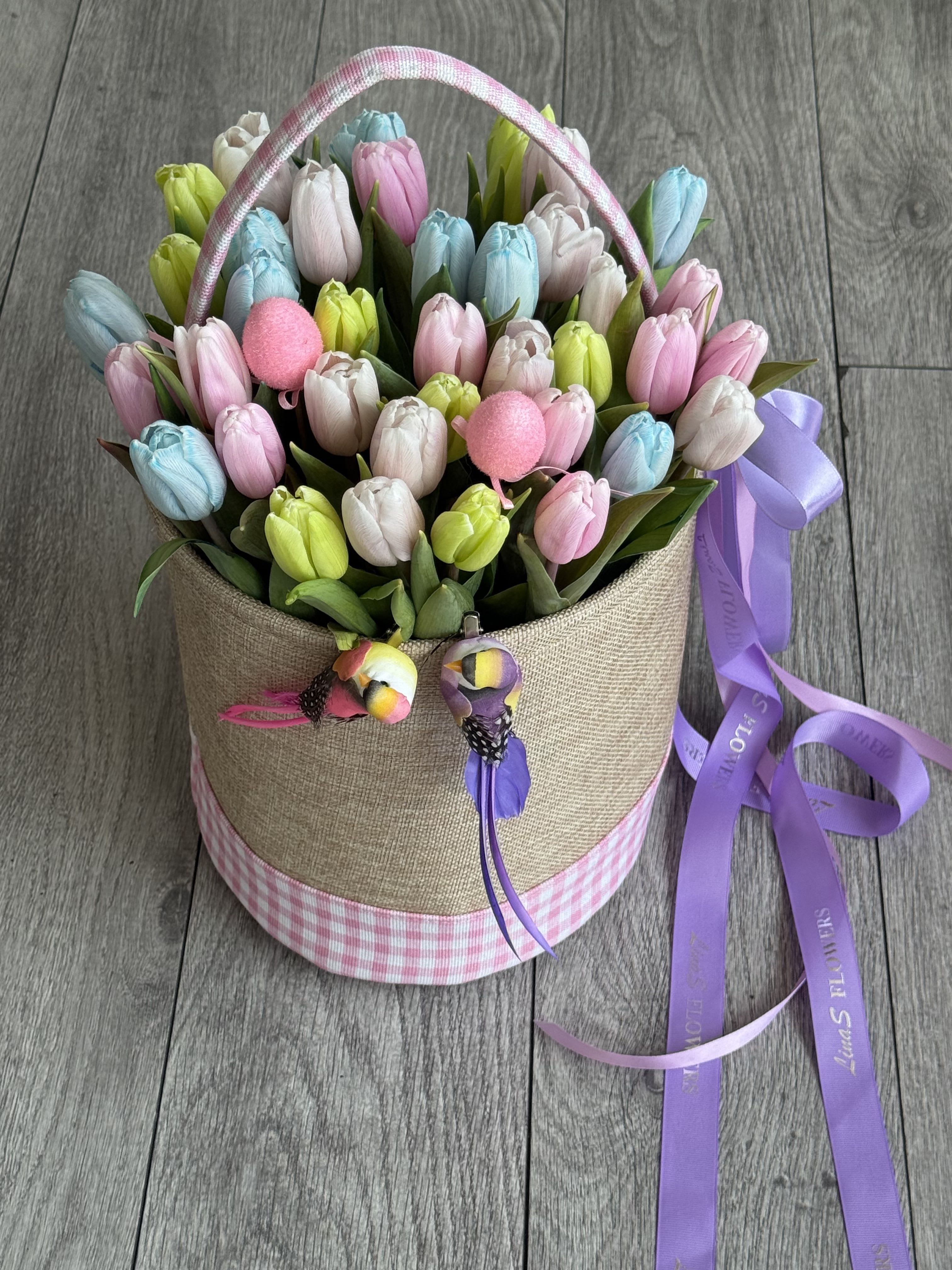 Easter basket  - Soft, pastel tulips in a rainbow of colors bring a fresh, joyful touch to Easter baskets—symbolizing renewal, warmth, and the beauty of spring. Delicate yet vibrant, they create a charming and elegant seasonal accent.