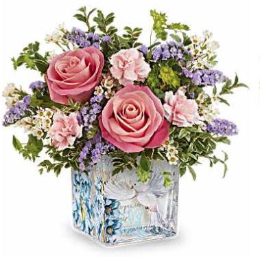 Whispers of Grace - Teleflora's Whispers of Grace Bouquet features pink roses, miniature pink carnations, lavender sinuata statice, white waxflower, bupleurum, and oregonia, arranged in Teleflora's Written In The Sky Cube, a glass cube featuring a dove and floral design.