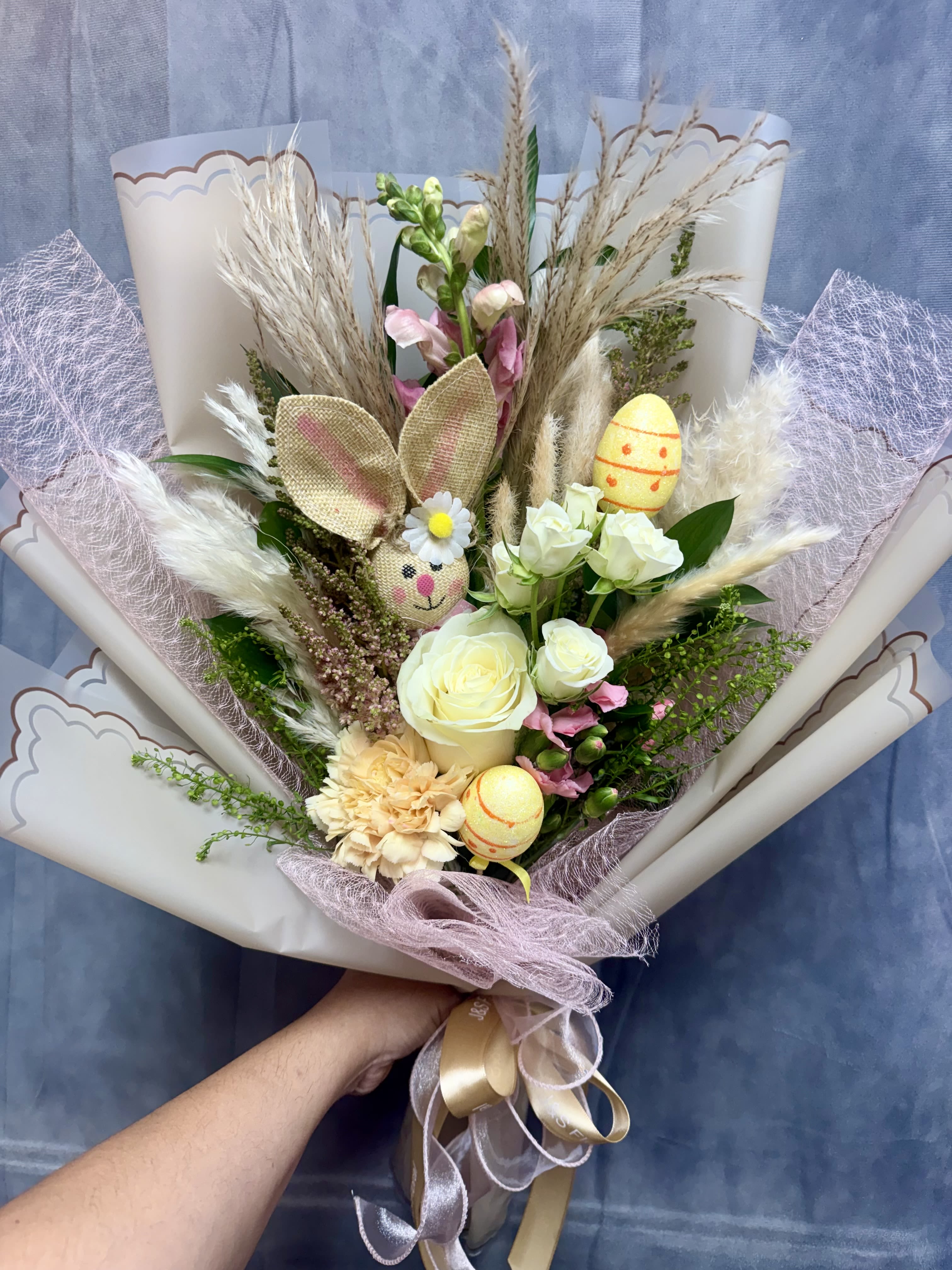 Easter Charm Bouquet  - A delightful combination of fresh flowers and textured accents with a playful bunny detail—perfect for gifting or decorating during the Easter season. Bunny might vary depending on availability 