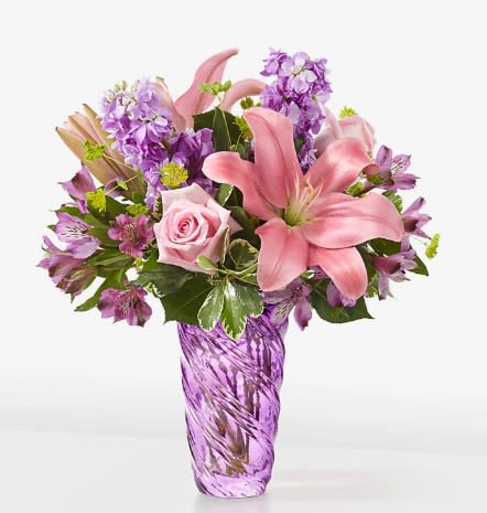 Precious Petals Bouquet with Luxe Swirl Vase - Precious Petals Bouquet with Luxe Swirl Vase The beauty of spring can be discovered within the Precious Petals Bouquet, an enchanting blend of lavenders and pinks to create a memorable and uplifting gift for yourself or someone special.