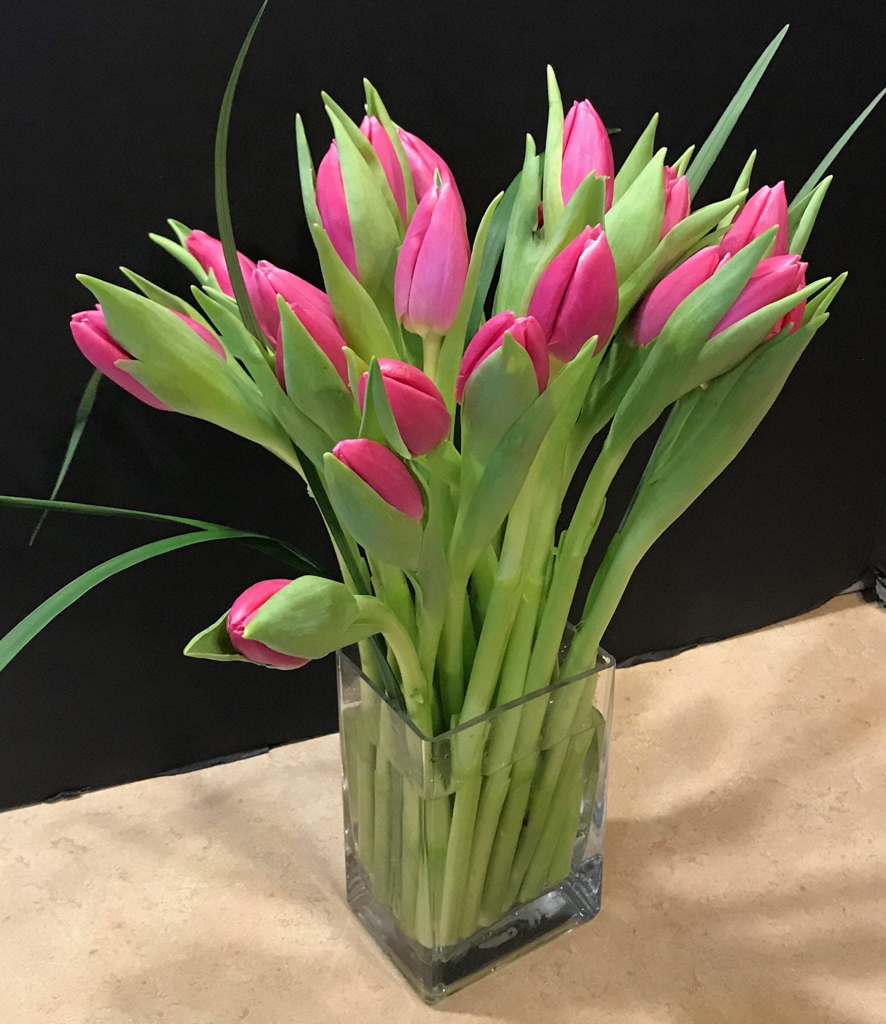 Simply Tulips $60/75/90 - This clean modern design is sure to please a tulip lover, no muss no fuss. We are happy to use other colors if available.  Please leave your color choice in the card message section (IN CAPITAL LETTERS), or call us at 631-539-8887