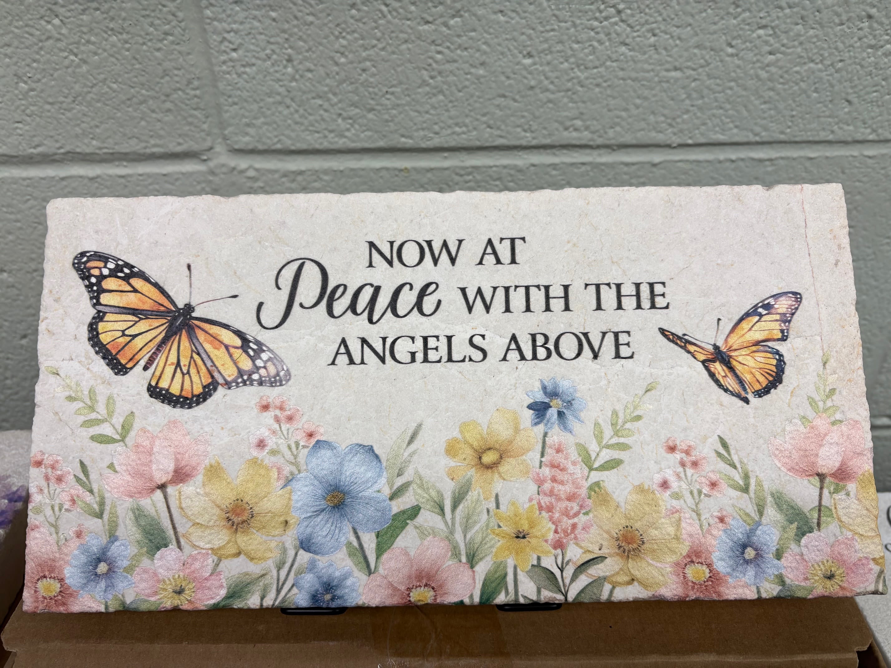 "Peace" Marble Paver with Easel - This marble paver pictures butterflies among flowers along with the commemorating phrase: "Now at Peace with the Angels above"