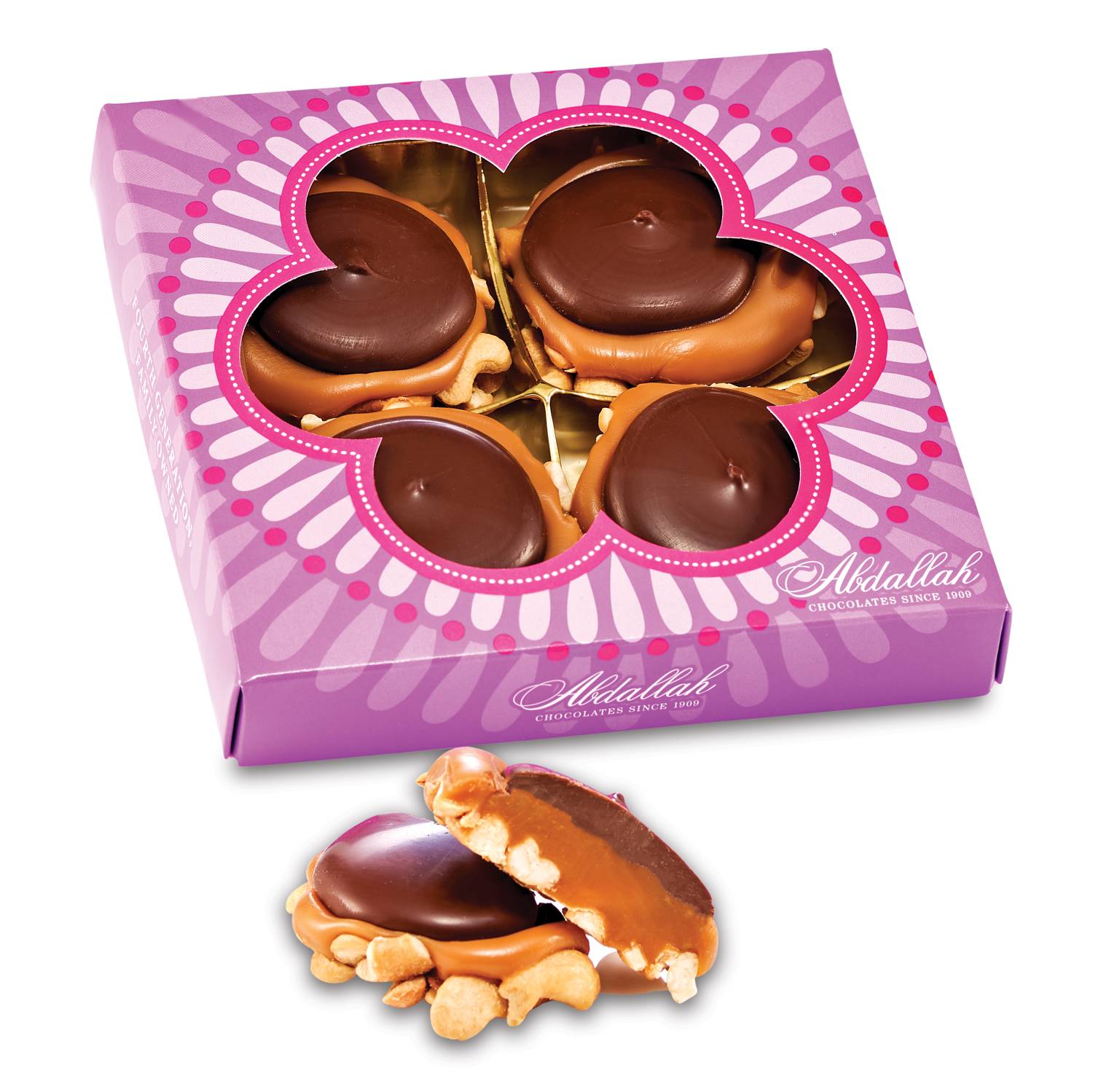 Box of chocolate-covered treats with one piece shown outside the package