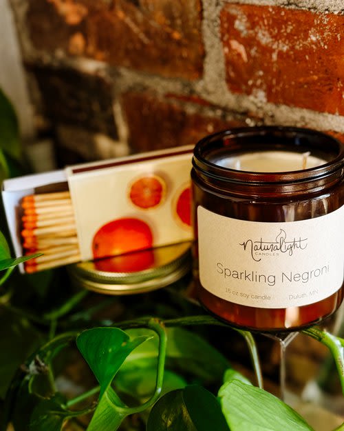 Natural Lights Candle, Sparkling Negroni - Locally made in Duluth and available in 14 oz jar.