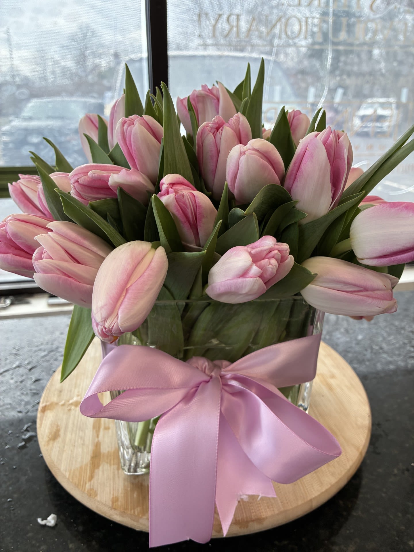 Pink Bunny Tulips - Just in for Easter...........pink double tulips from Holland. Arranged in a 51/2 inch glass Cube. About 35 double tulips - perfect for the gift or table centerpiece. - Standing about 12 inches tall X 10 inches wide.