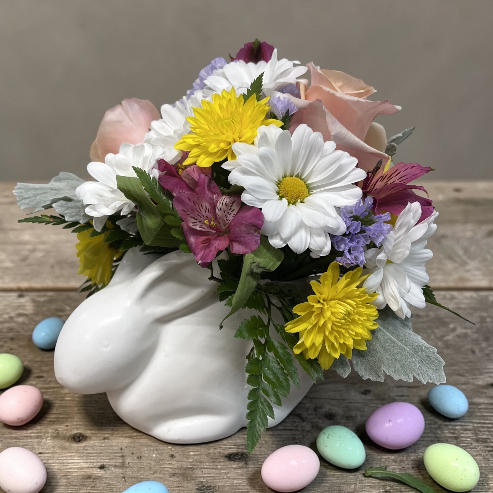 Hoppity - This little guy packs in a generous helping of beautiful spring flowers and other seasonal blooms into a simple and stylish ceramic vase suitable for spring decoration.