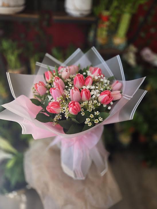 Korean Wrapped series - Tip Toe Thru the Tulips - Tulips are featured in this lovely arrangement, wrapped in Korean Paper with a sheer bow. 