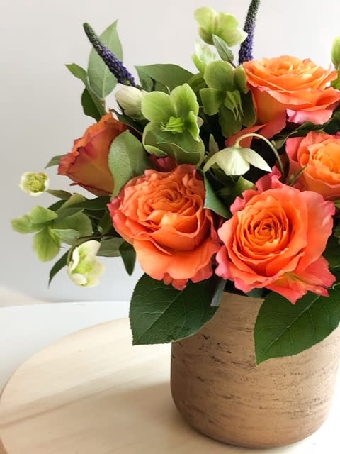Free Spirit Bouquet - Bright and Cheerful Bouquet made up of Free Spirit Roses. One of my favorite roses to work with as they remind me of the sunset and how beautiful life can be. Free Spirit Roses open up as perfectly ruffled petals, instantly brightening your home. 
