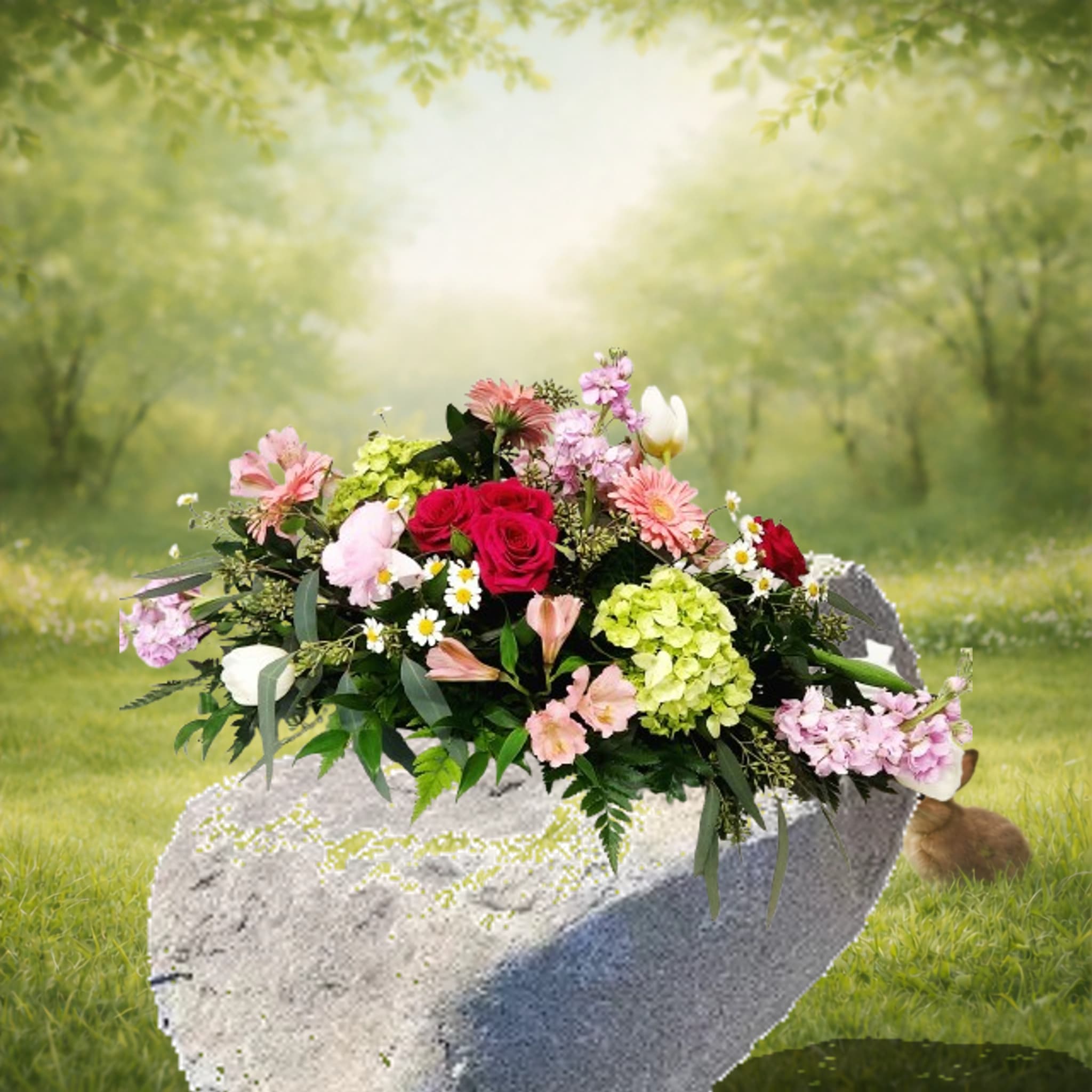 Spring Time Spread - For those bigger family tables, this one just feels right. A beautiful mix of soft and bold spring colors comes together in a way that feels full, happy, and welcoming.  Featuring roses, hydrangea, spray roses, stock, alstroemeria, tulips, and cheerful gerbera daisies, it’s a gathering of some of our favorite blooms—designed to feel rich, natural, and full of life.  It’s the kind of arrangement that fills the table, brings everyone a little closer, and makes any get-together feel just a bit more special. Bolder not included.