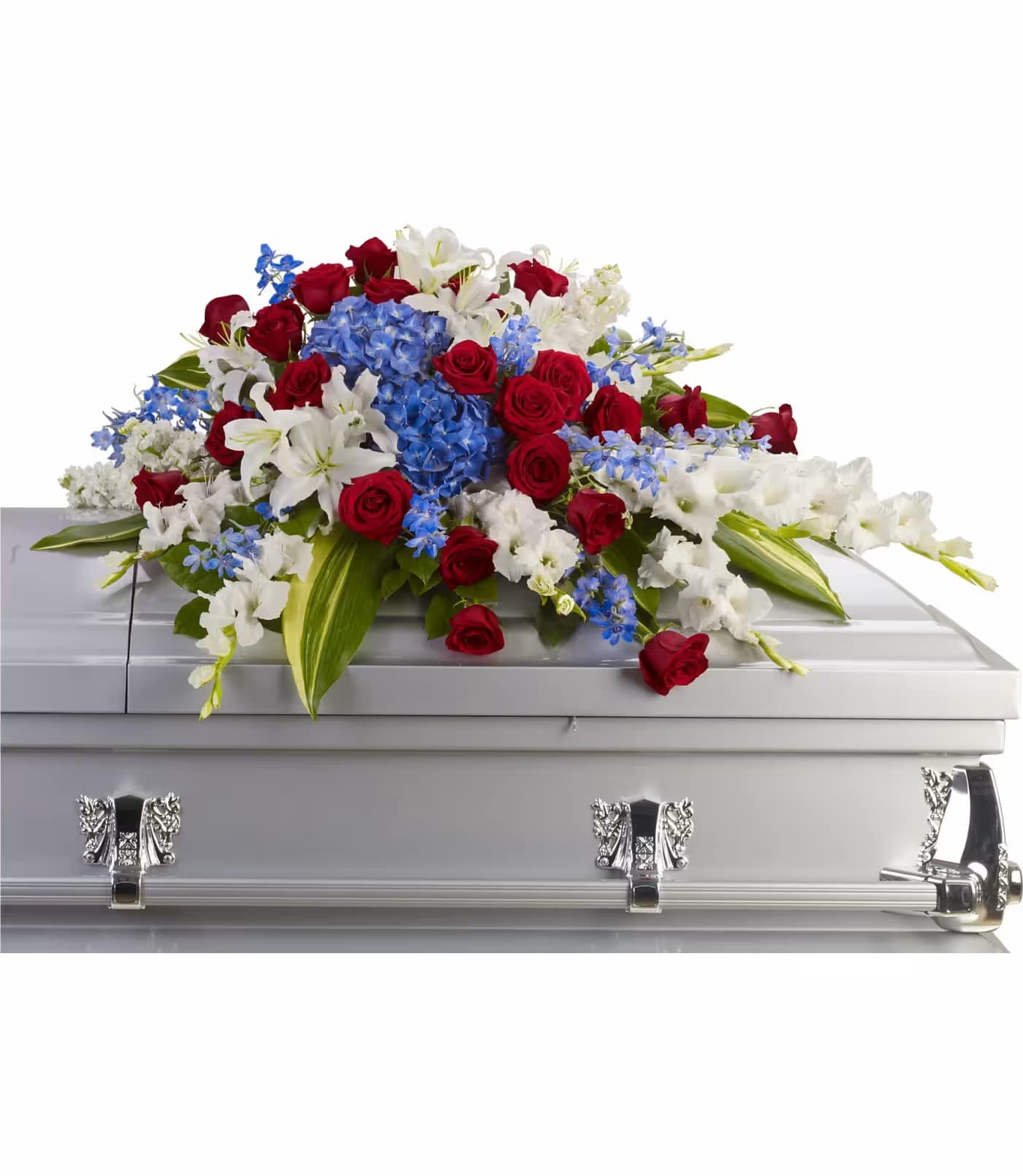 Distinguished Service Casket Spray - A beautifully patriotic way to pay tribute to a loved one. This half-couch spray sends an eloquent message of strength, respect and freedom.